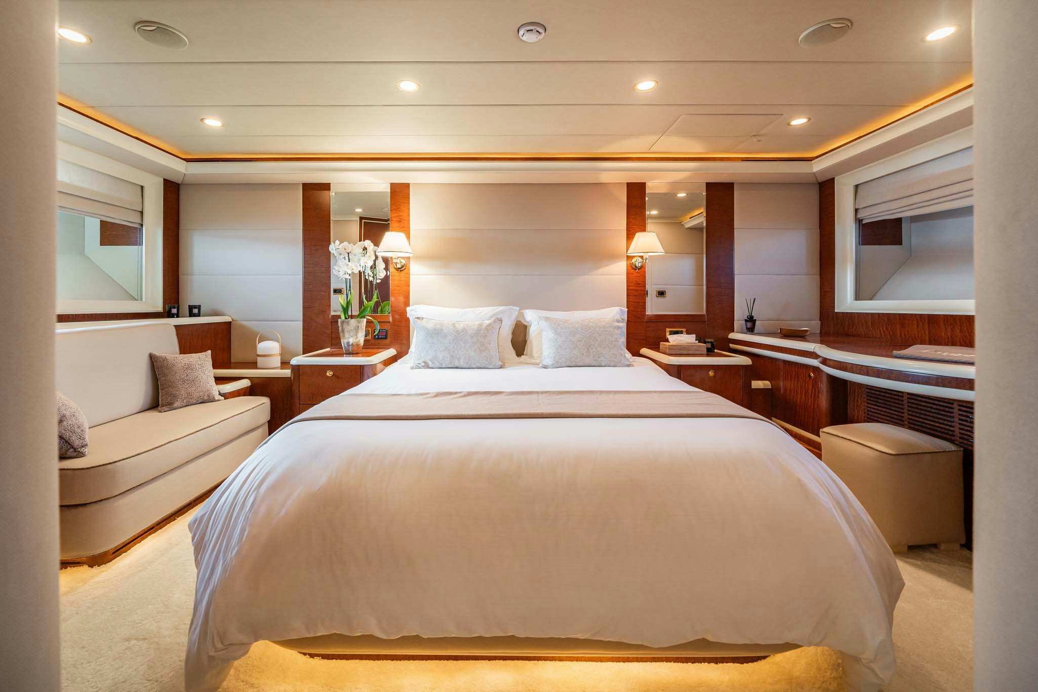 a large bed in a hotel room aboard VIKING III Yacht for Charter