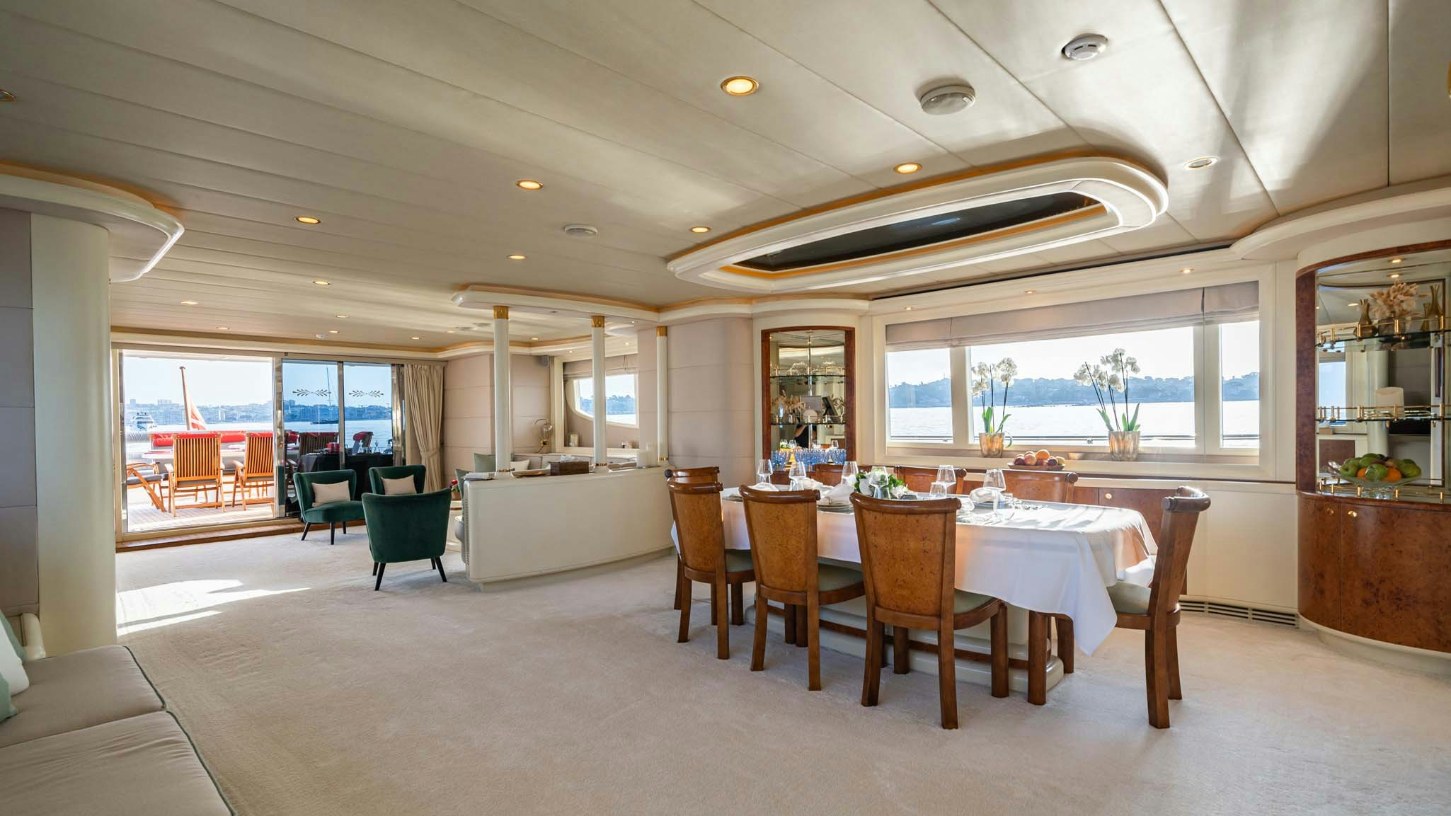 a large dining room with a table and chairs aboard VIKING III Yacht for Charter