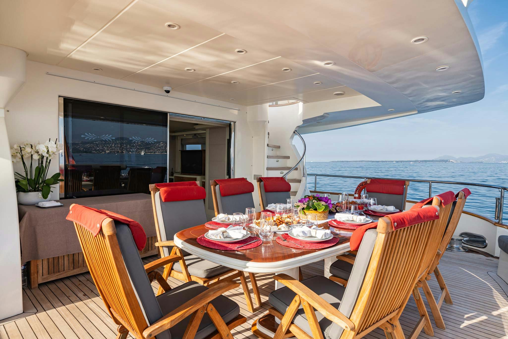 a room with a table and chairs aboard VIKING III Yacht for Charter