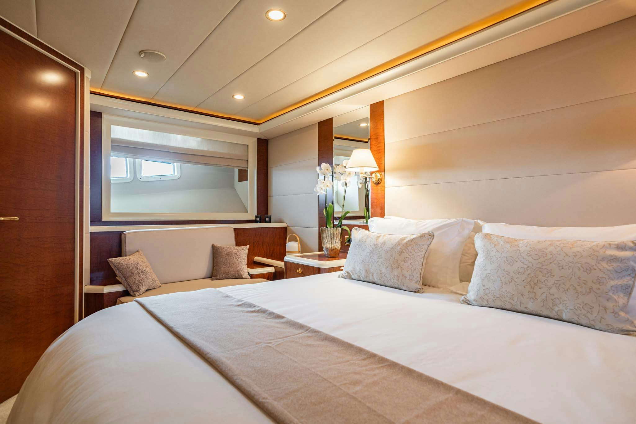 a bed with pillows and pillows aboard VIKING III Yacht for Charter