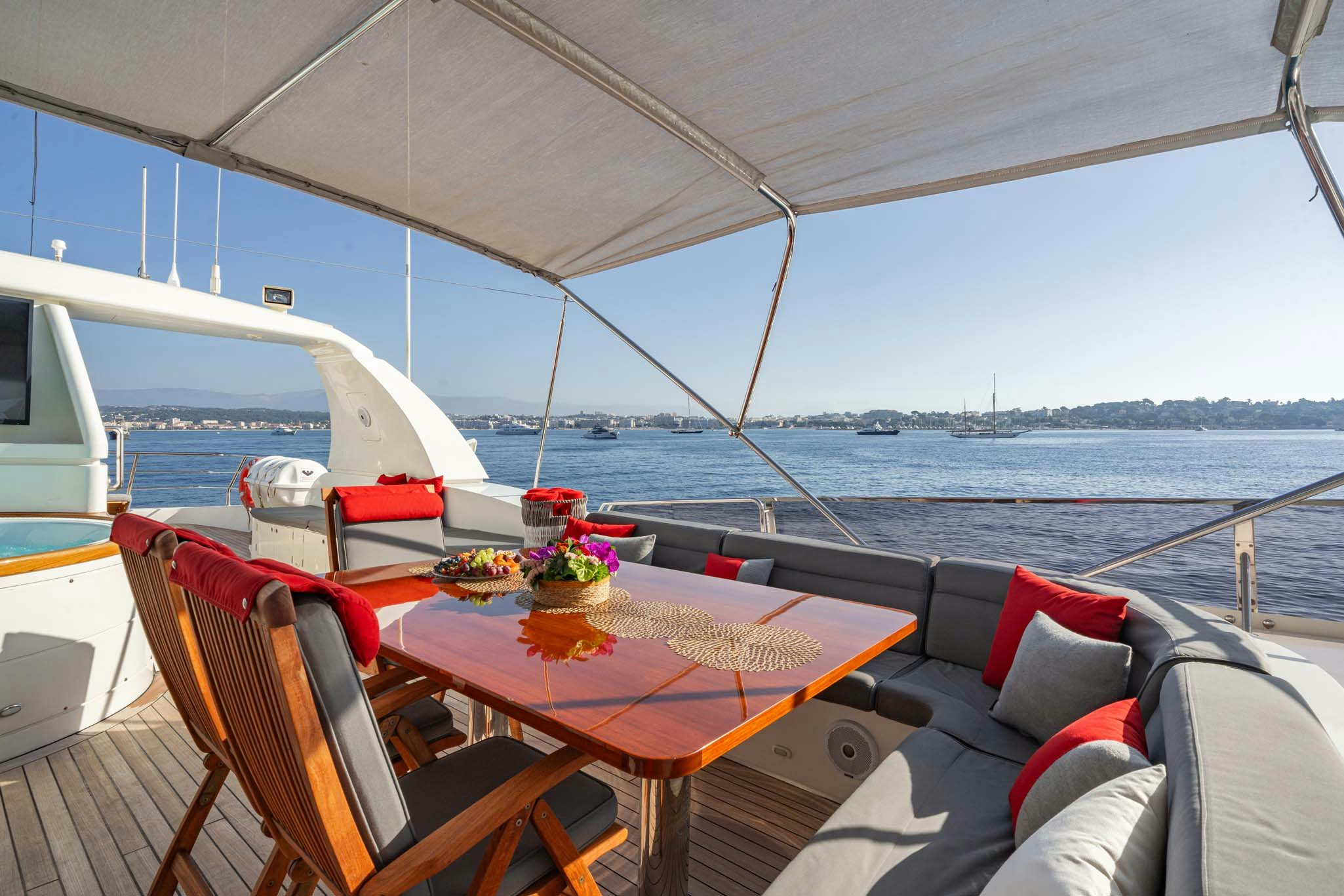 a boat with a table and chairs on it aboard VIKING III Yacht for Charter