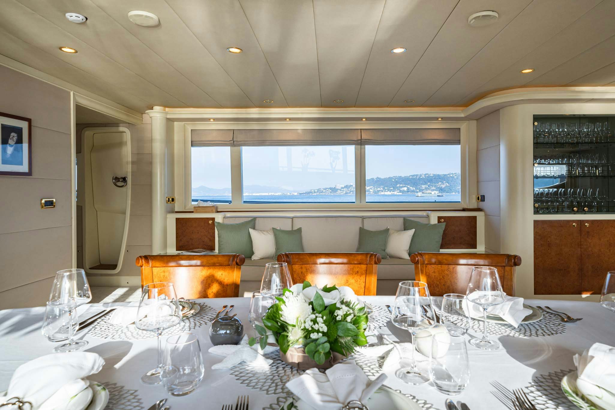 a table set for a dinner aboard VIKING III Yacht for Charter