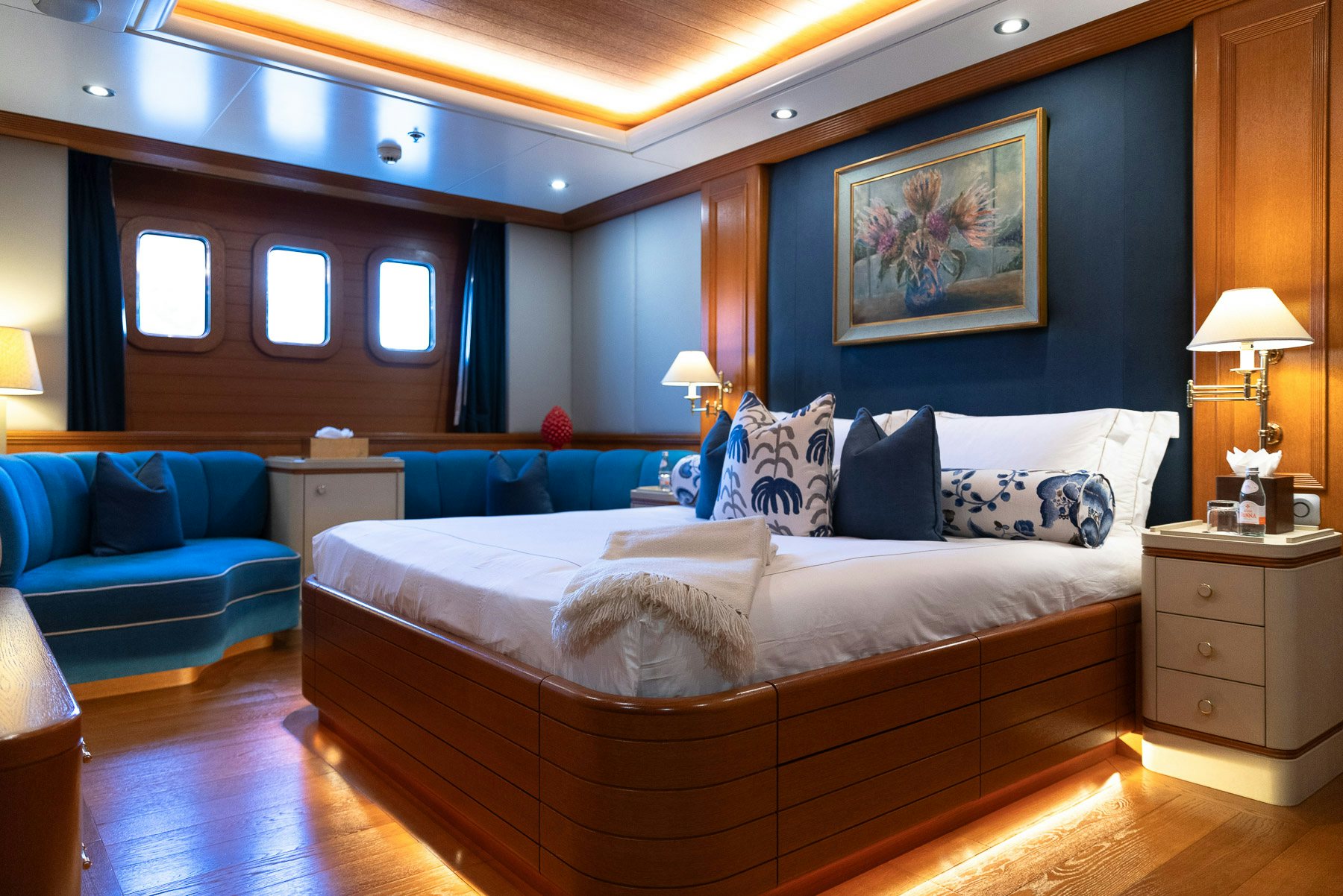 a large bed in a room aboard BOADICEA Yacht for Charter