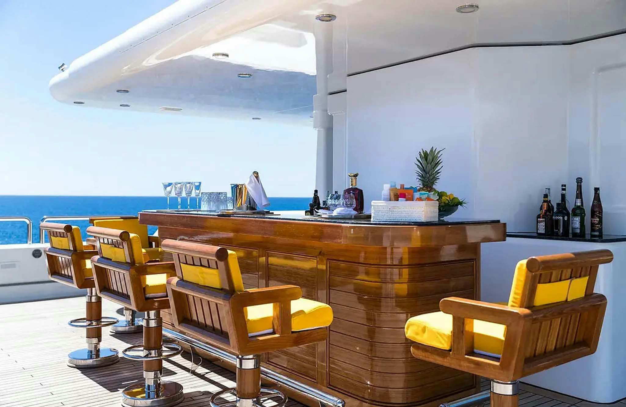 a room with a table and chairs aboard BOADICEA Yacht for Charter