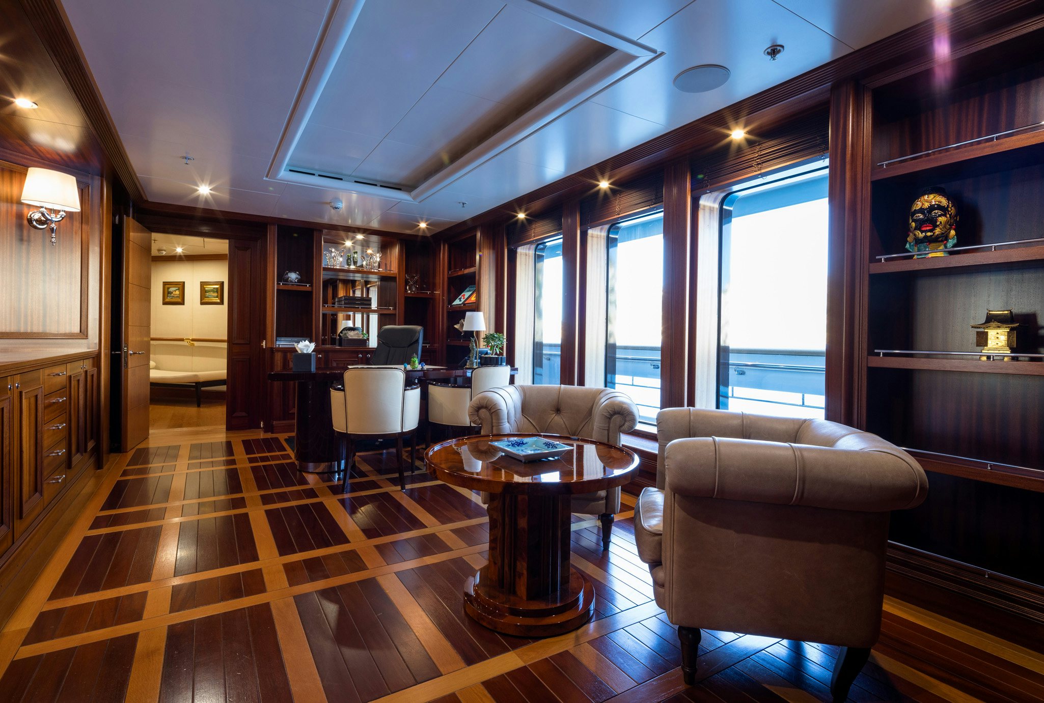a living room with wood floors aboard BOADICEA Yacht for Charter