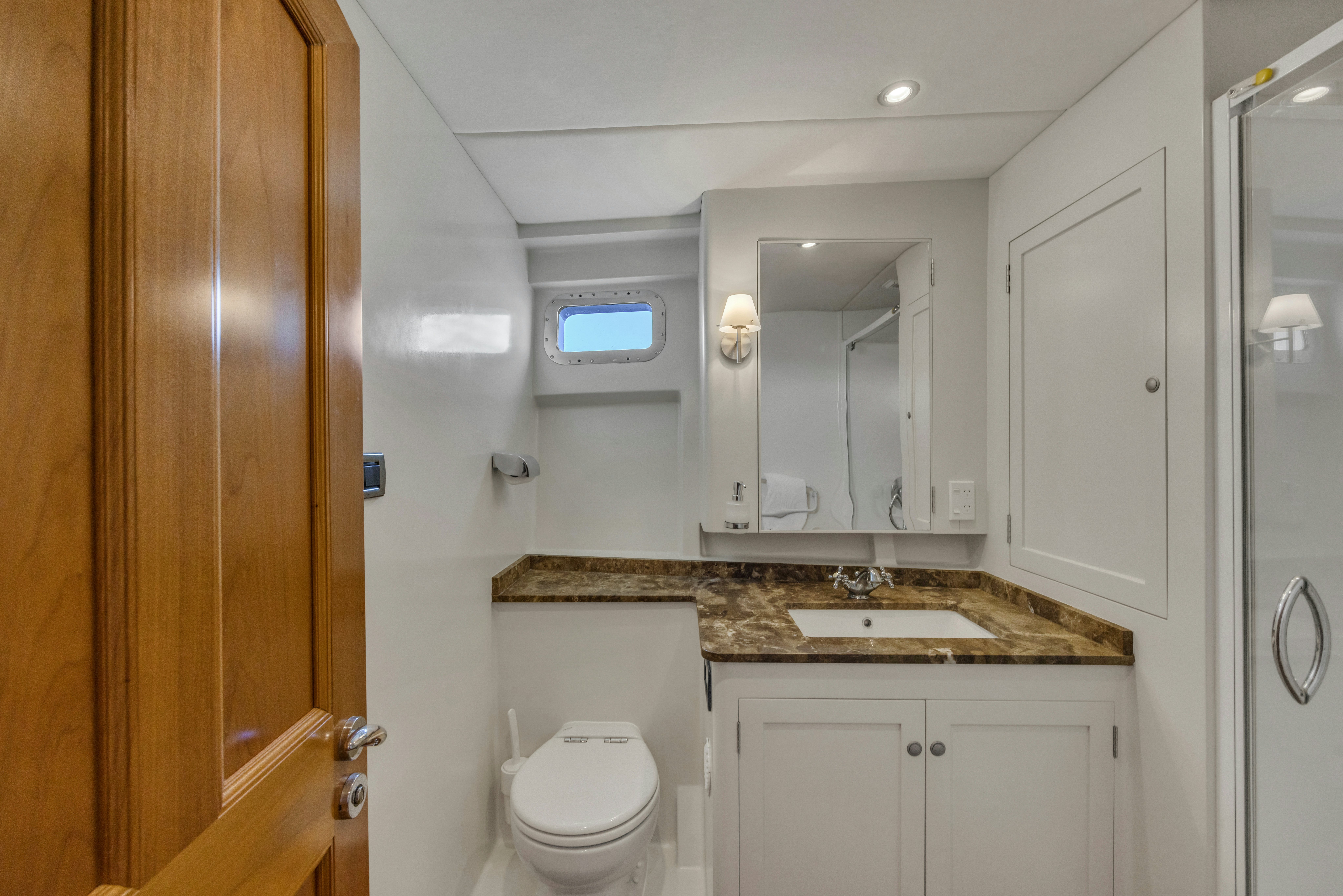 a bathroom with a sink and a toilet aboard TASMAN Yacht for Sale