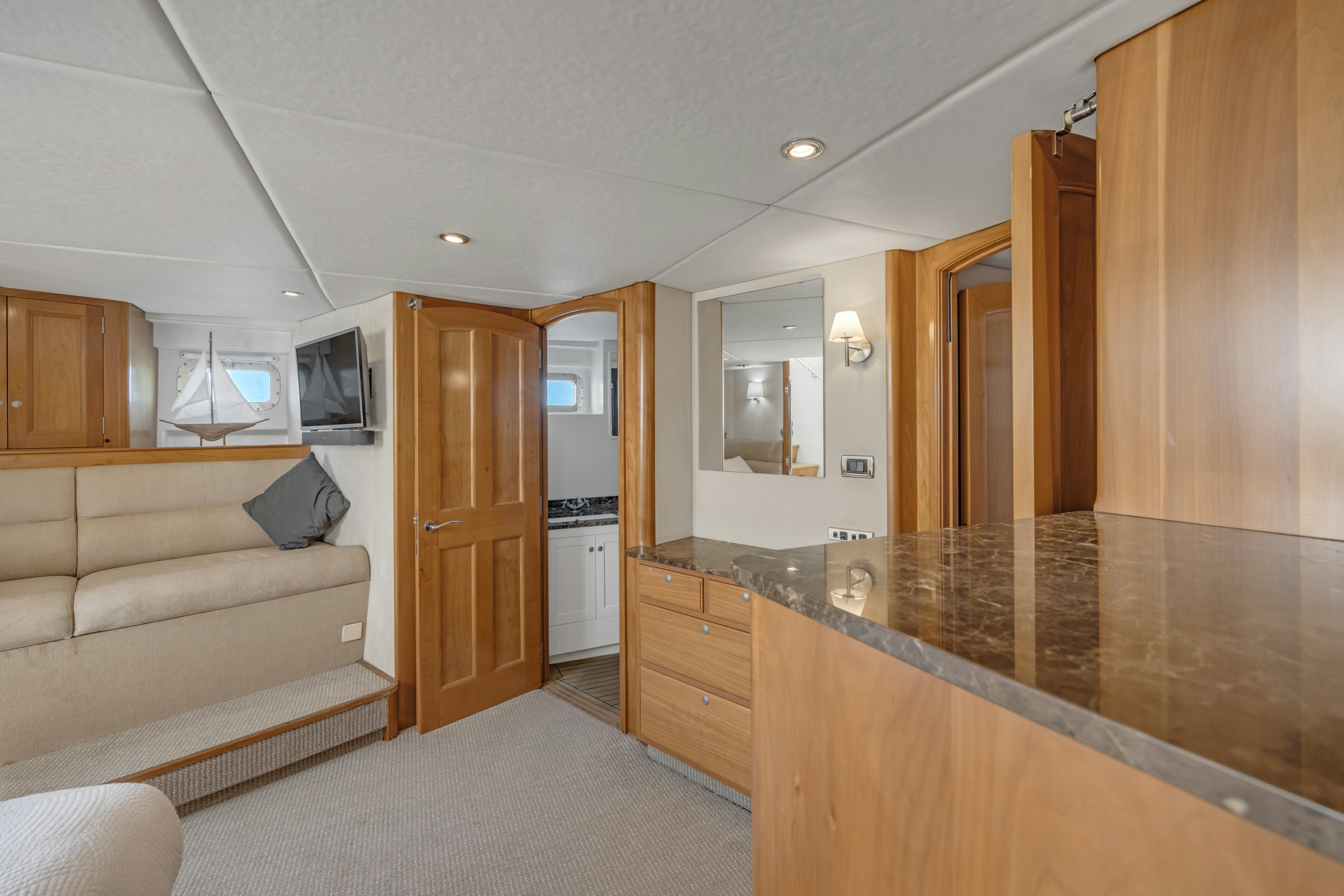 a large kitchen with a large island aboard TASMAN Yacht for Sale