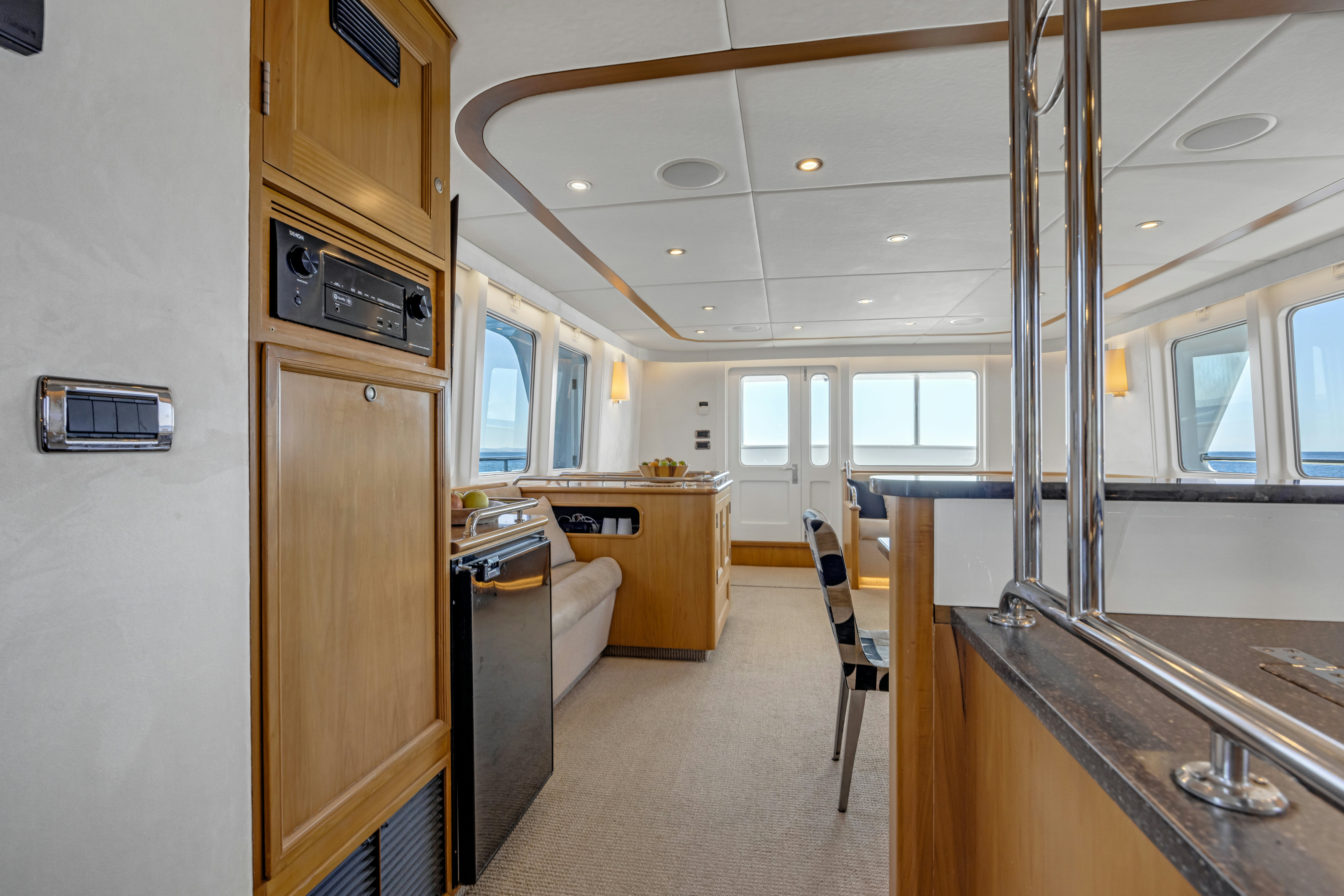 a kitchen with a large island aboard TASMAN Yacht for Sale