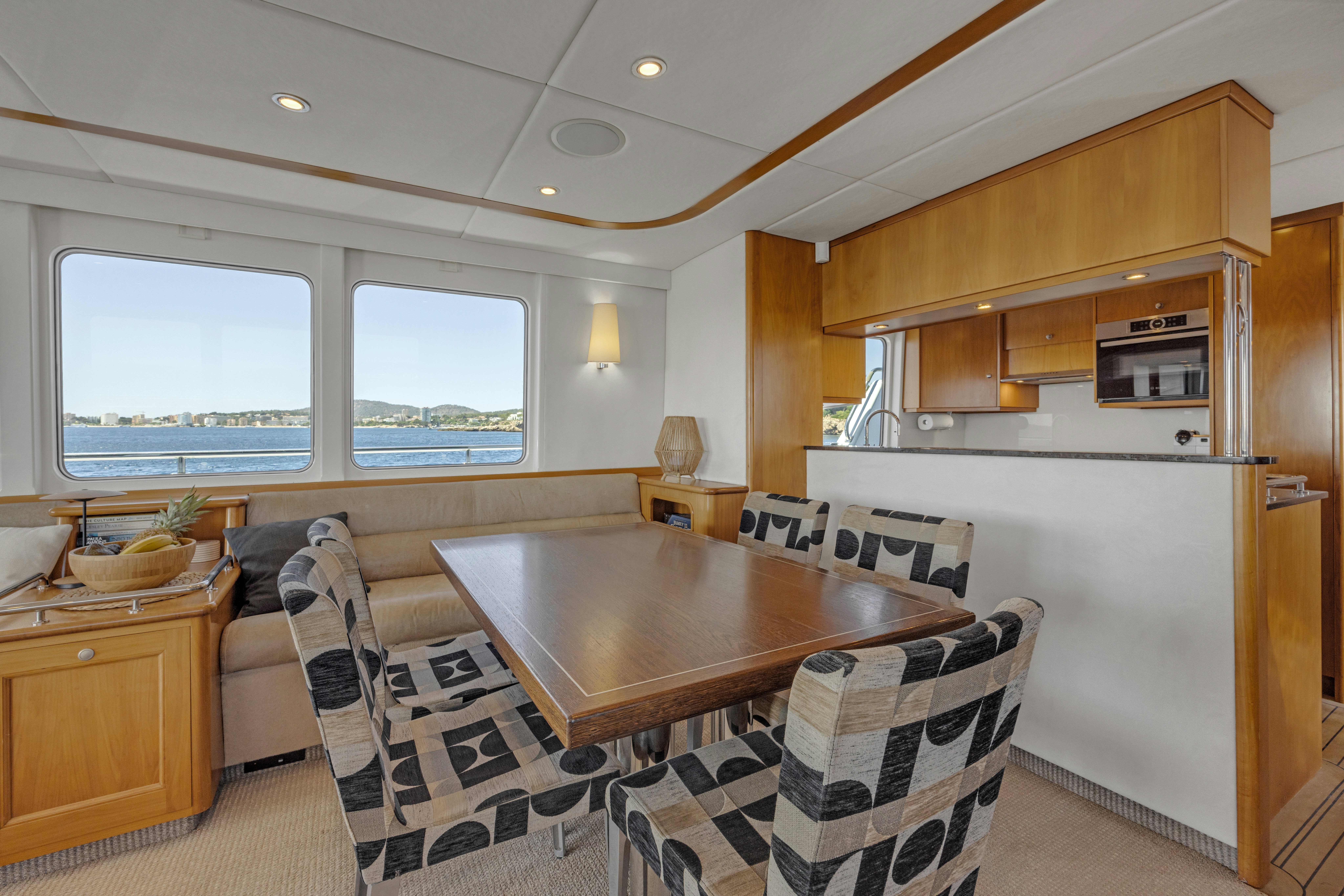 a kitchen and living room aboard TASMAN Yacht for Sale