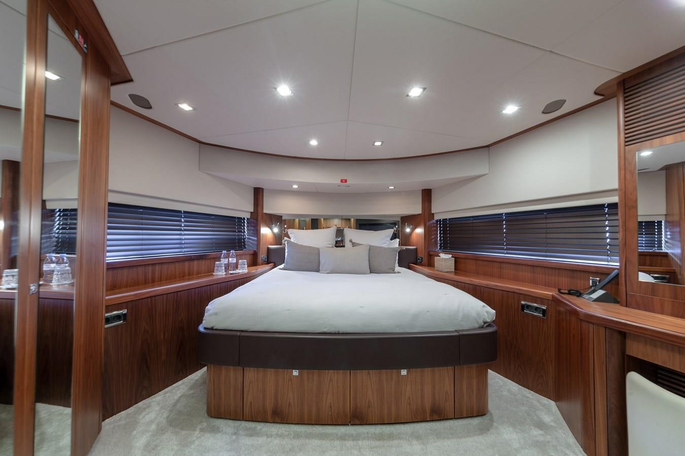 a room with a bed and a window aboard MR SEA Yacht for Sale