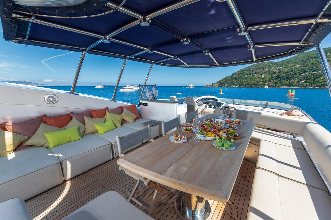 a boat with a table and chairs aboard MR SEA Yacht for Sale