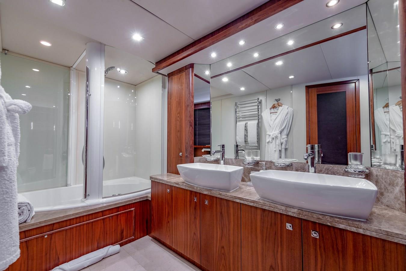 a bathroom with a large mirror aboard MR SEA Yacht for Sale