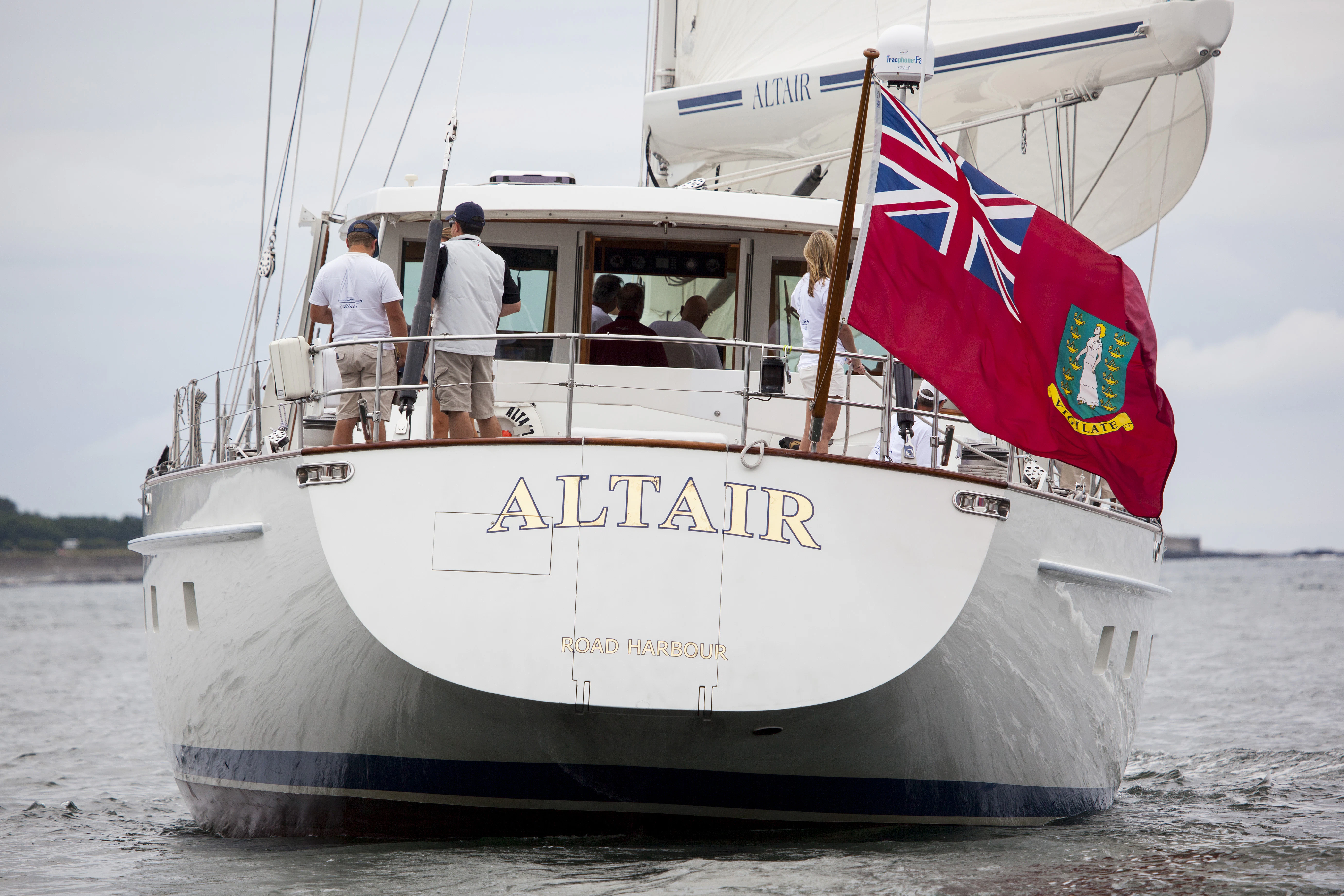 a boat with a flag on it aboard ALTAIR Yacht for Sale