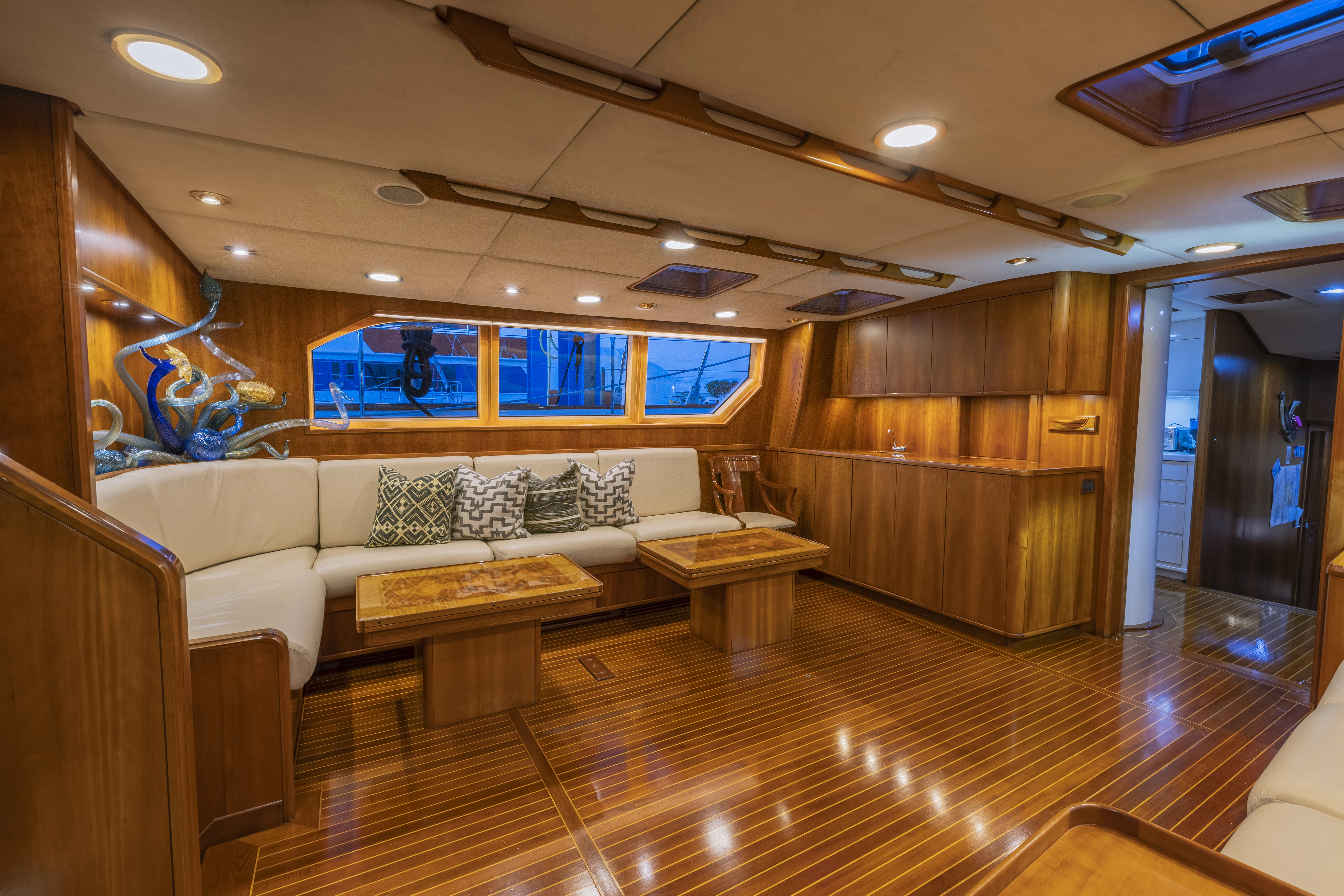 a living room with a couch and a television aboard ALTAIR Yacht for Sale