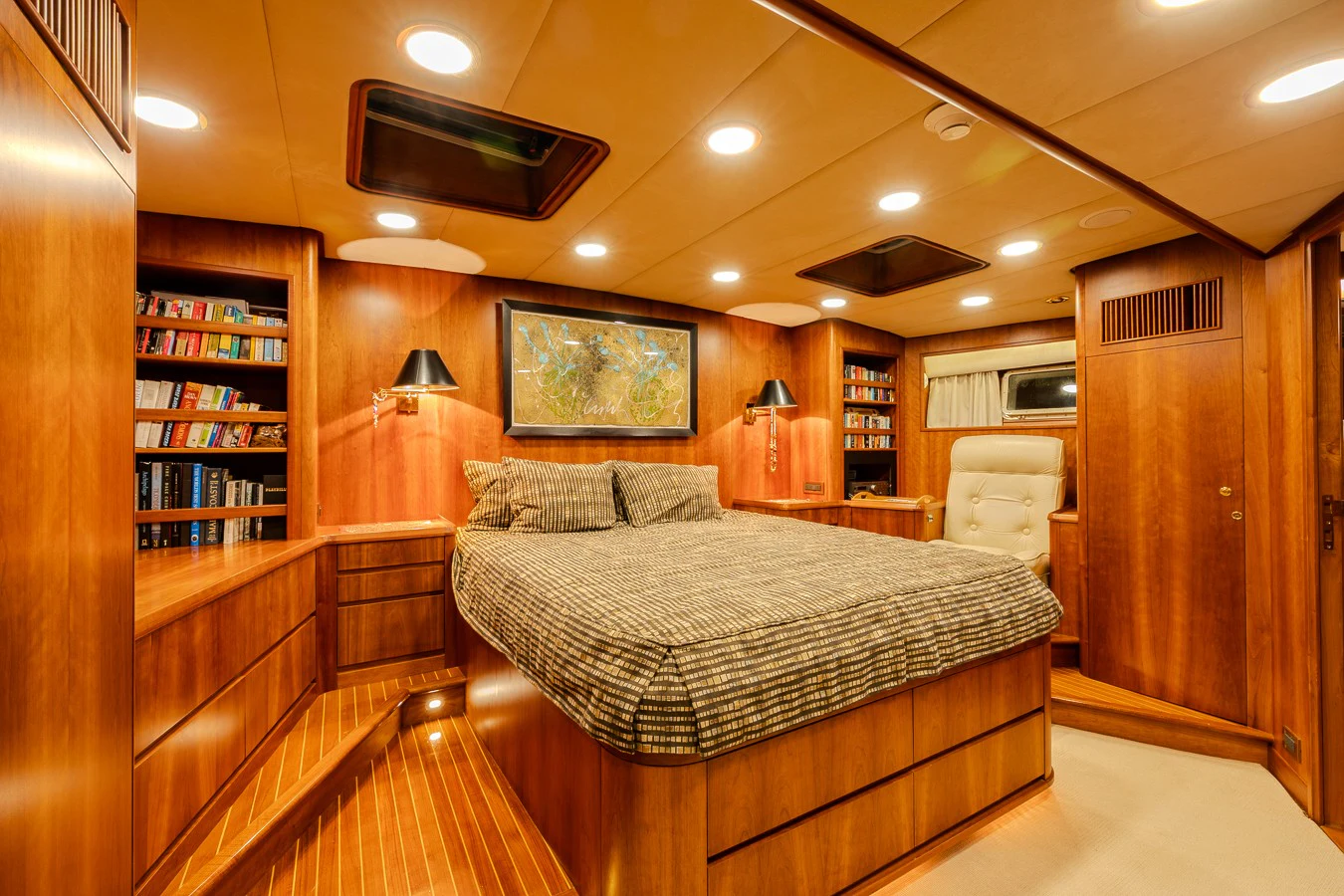 a bedroom with a large bed aboard ALTAIR Yacht for Sale