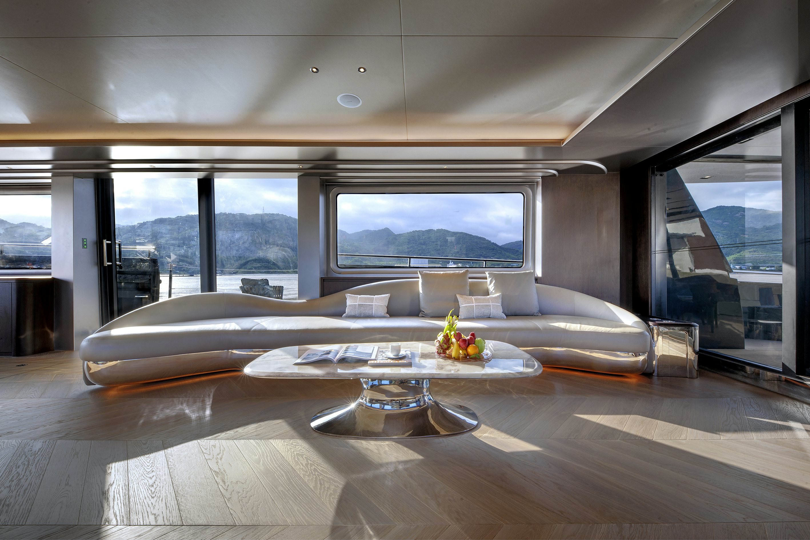 a room with a large window aboard ALLEGRO FLYBRIDGE 98 Yacht for Sale