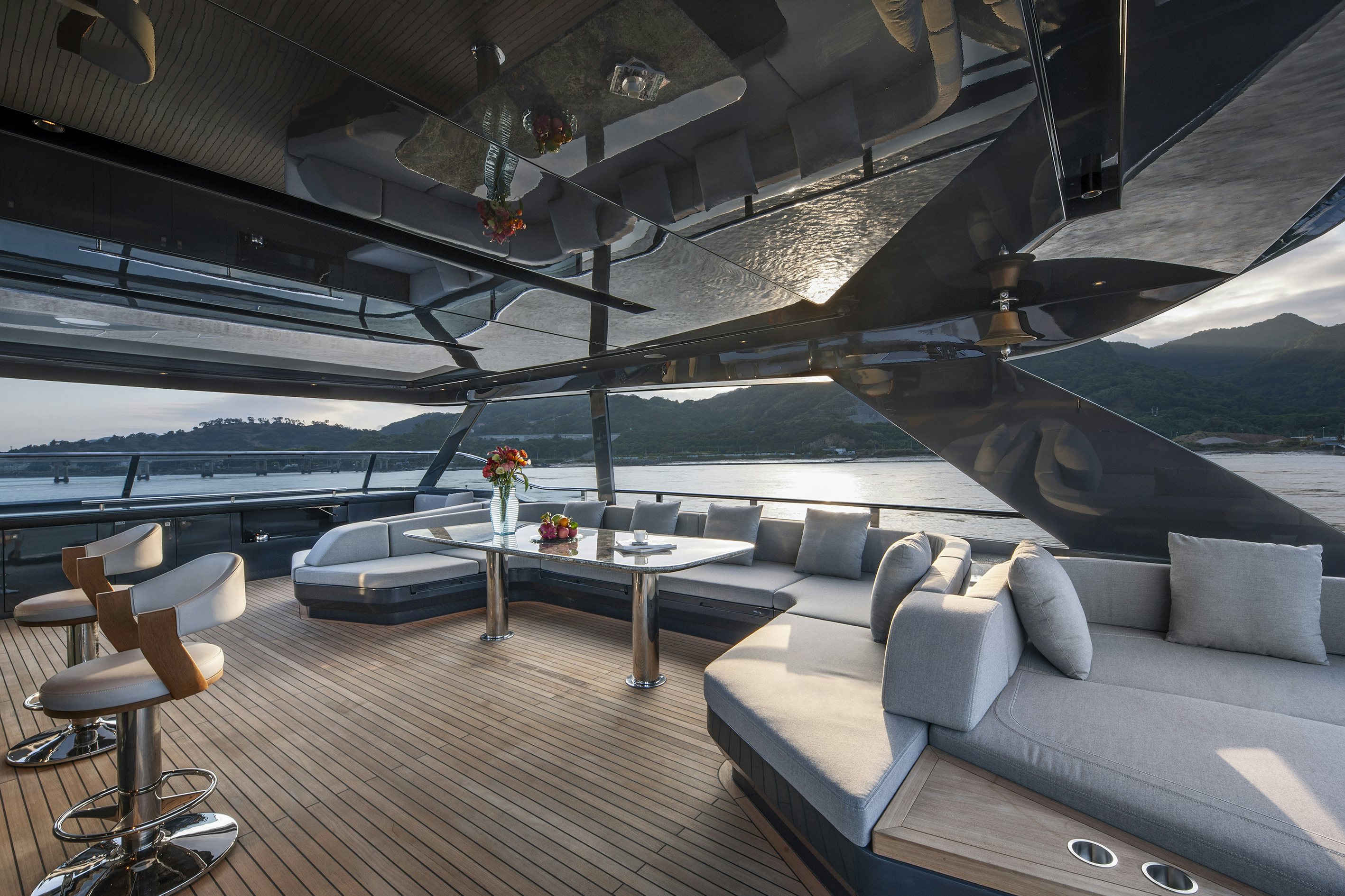 a modern living room with a large modern looking house aboard ALLEGRO FLYBRIDGE 98 Yacht for Sale