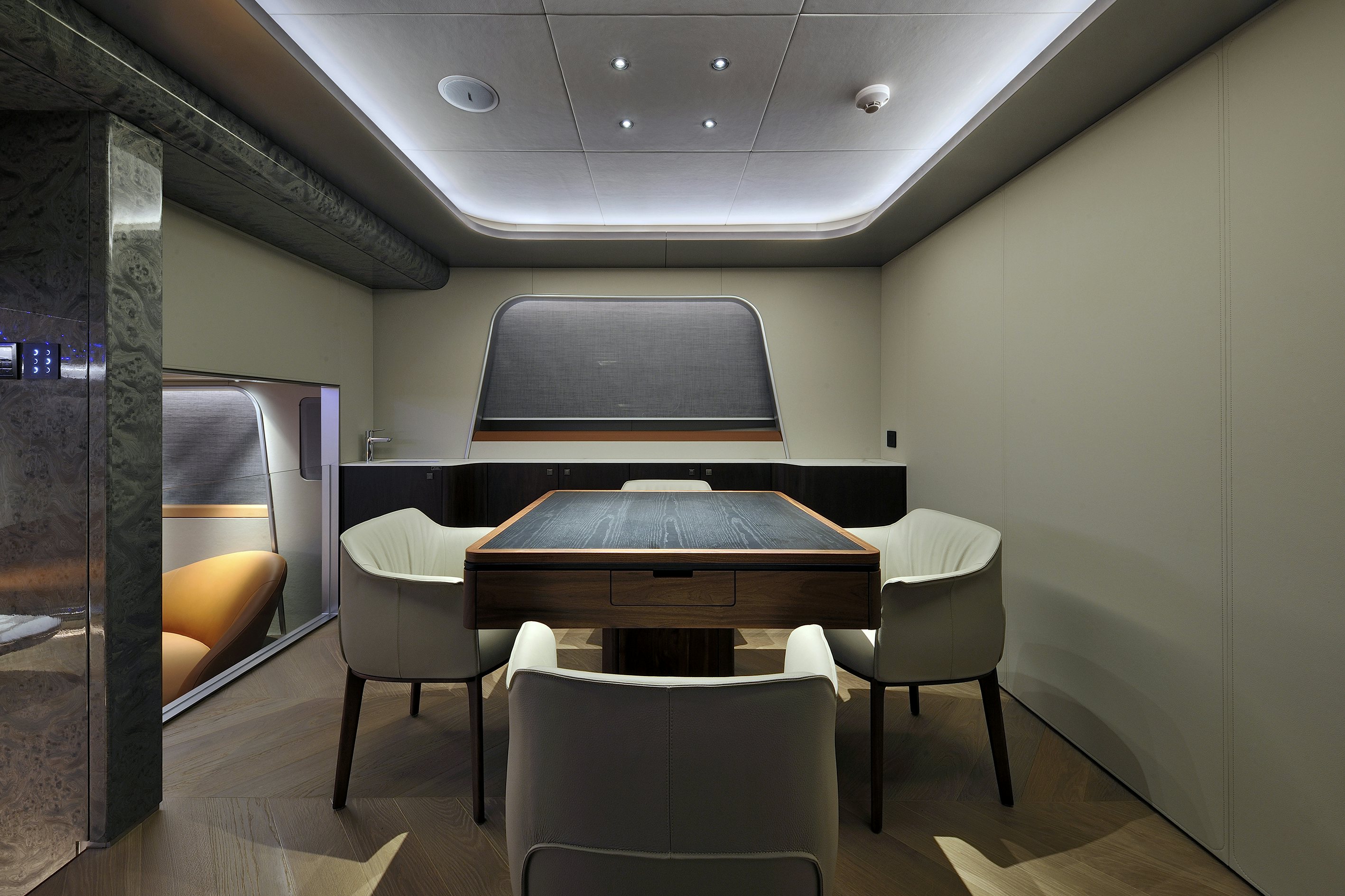 a room with a table and chairs aboard ALLEGRO FLYBRIDGE 98 Yacht for Sale