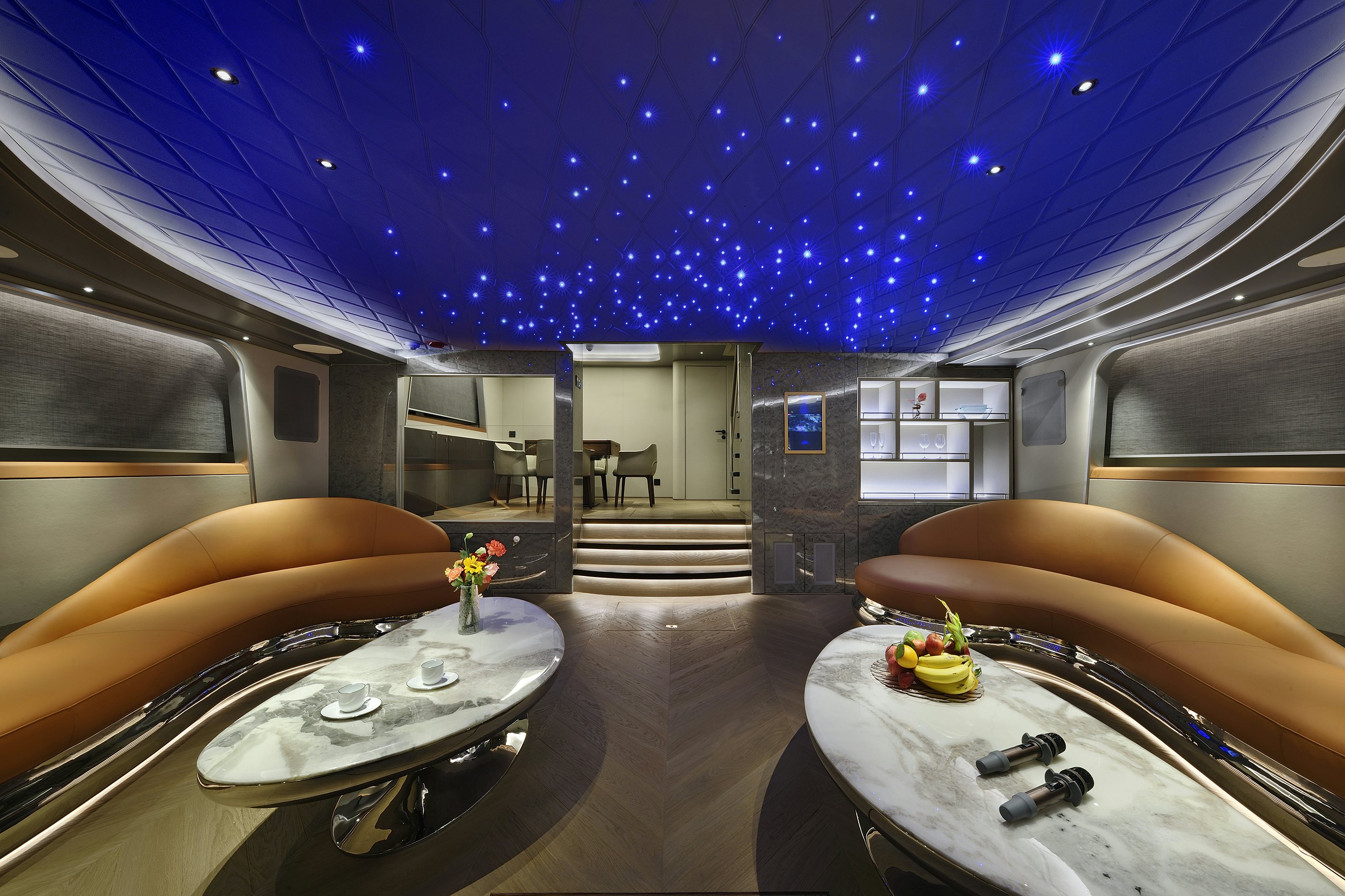 a room with a table and chairs aboard ALLEGRO FLYBRIDGE 98 Yacht for Sale