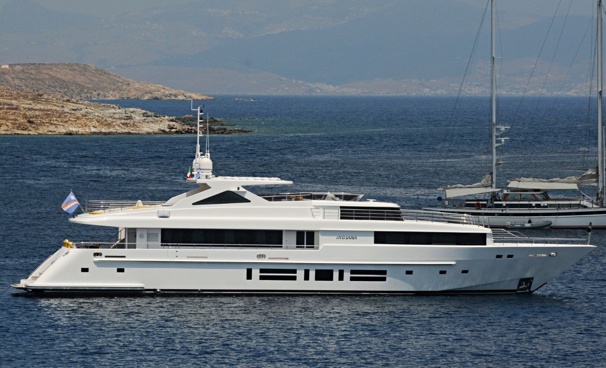 a white yacht in the water aboard INDIANA Yacht for Charter