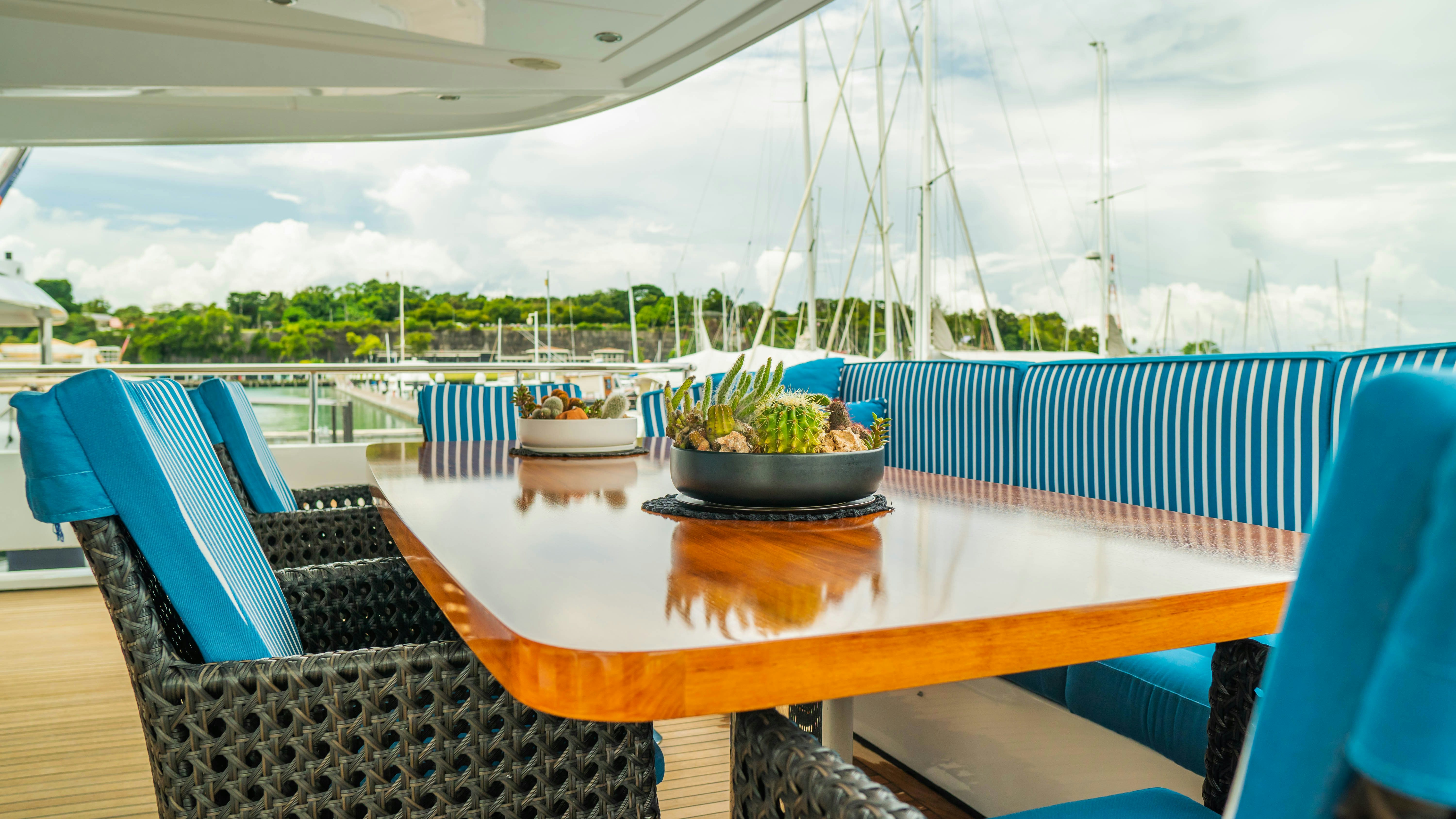 a table on a deck aboard INDIANA Yacht for Charter