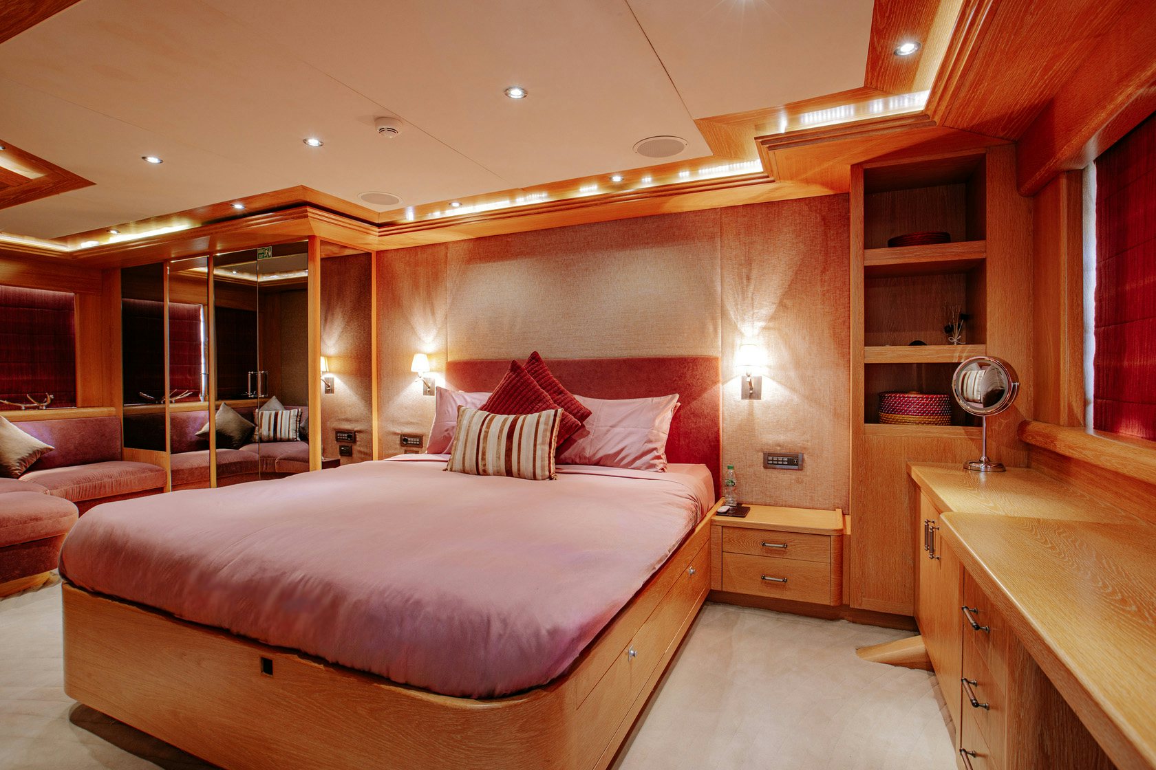 a bed in a room aboard INDIANA Yacht for Charter