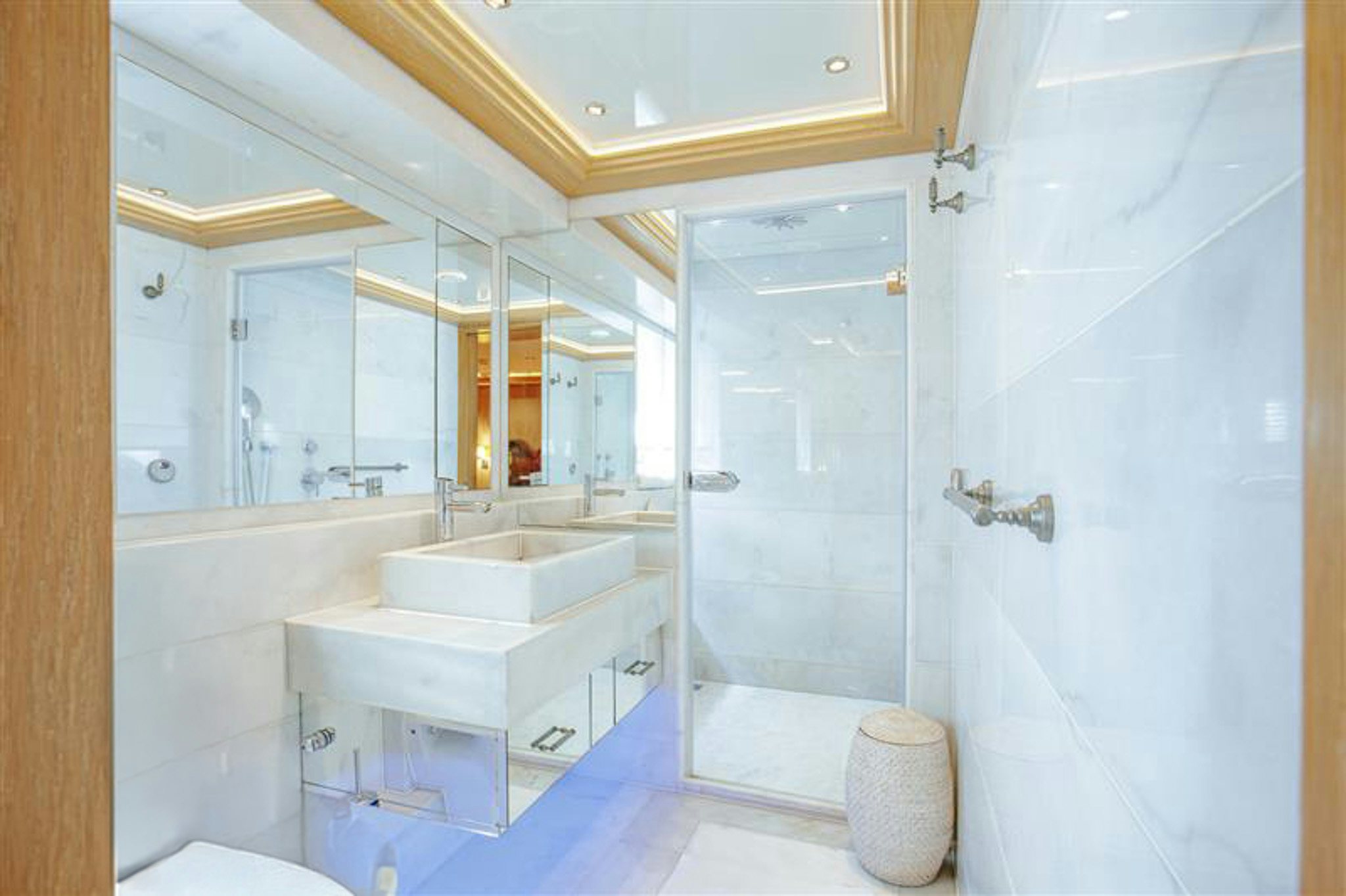 a bathroom with a tub sink and a shower aboard INDIANA Yacht for Charter
