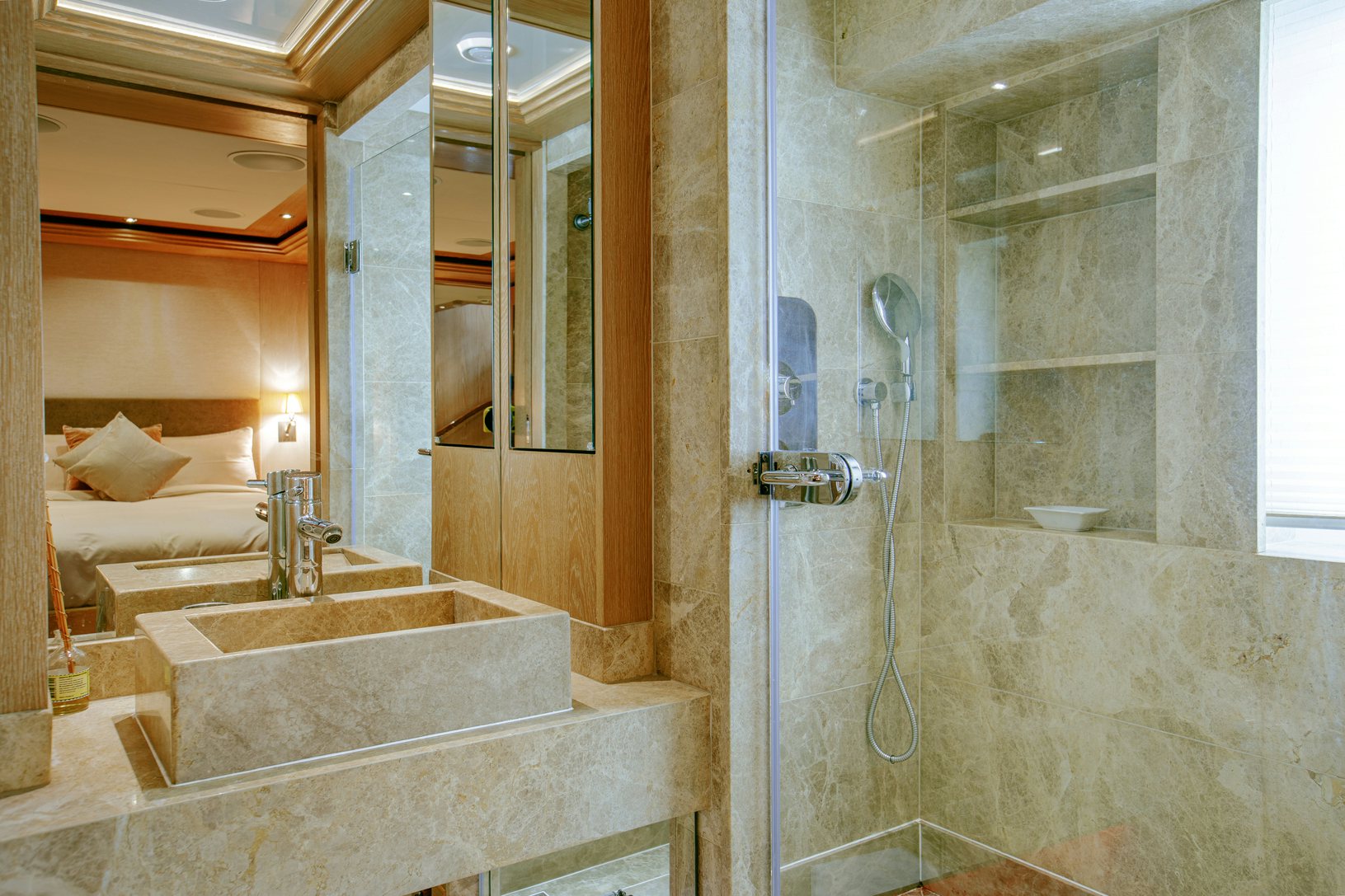 a bathroom with a tub and a sink aboard INDIANA Yacht for Charter