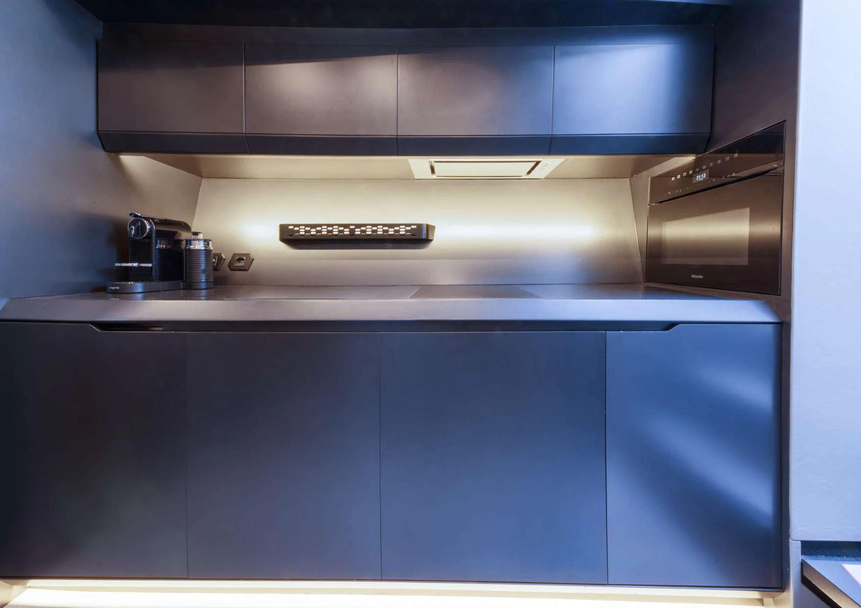 a machine on the counter aboard FAST ONE Yacht for Charter