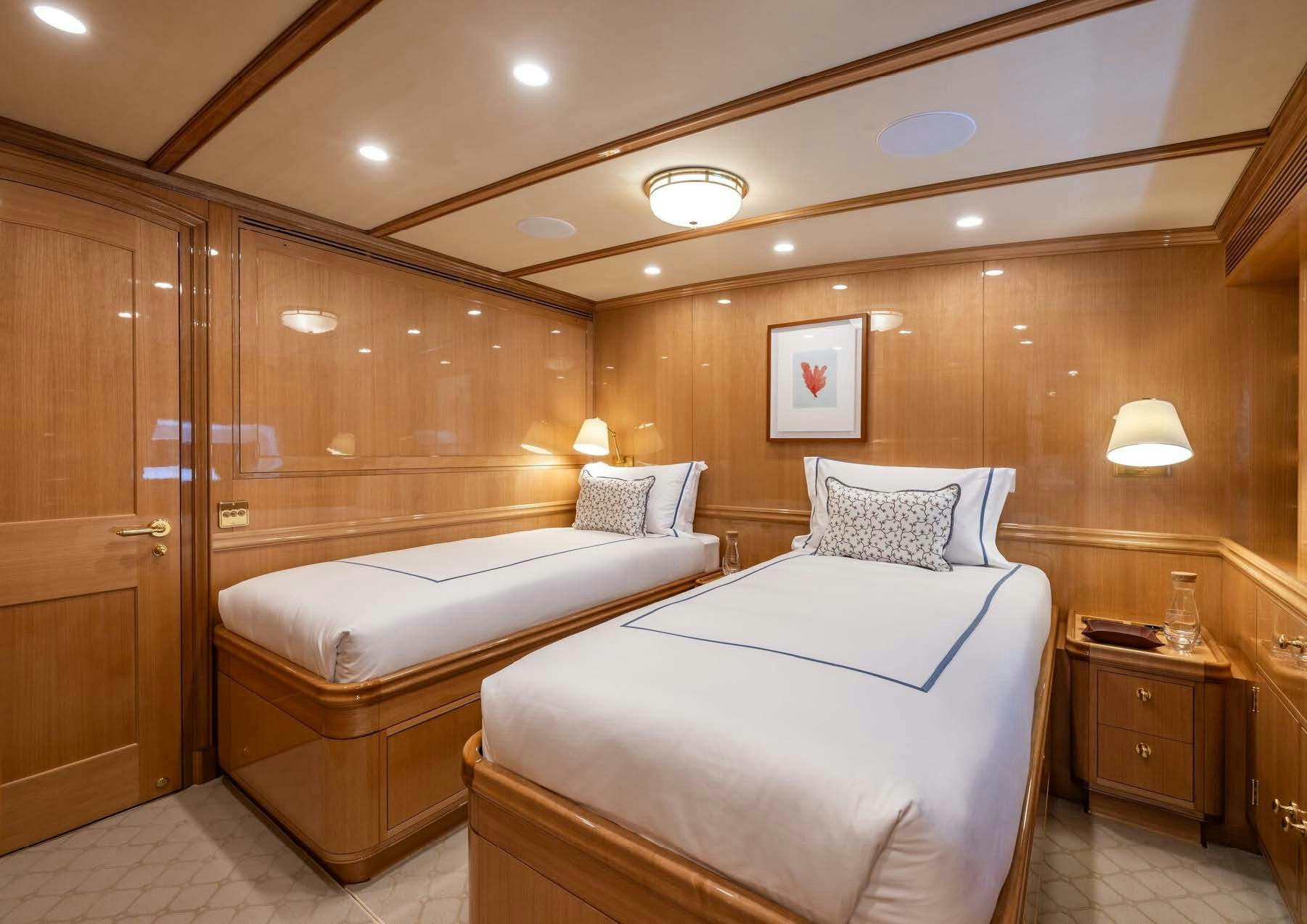 a room with two beds aboard MAXIMUS Yacht for Charter