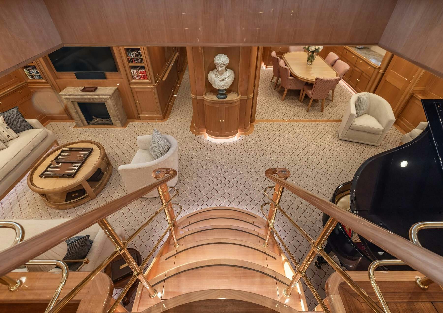 a room with a statue aboard MAXIMUS Yacht for Charter