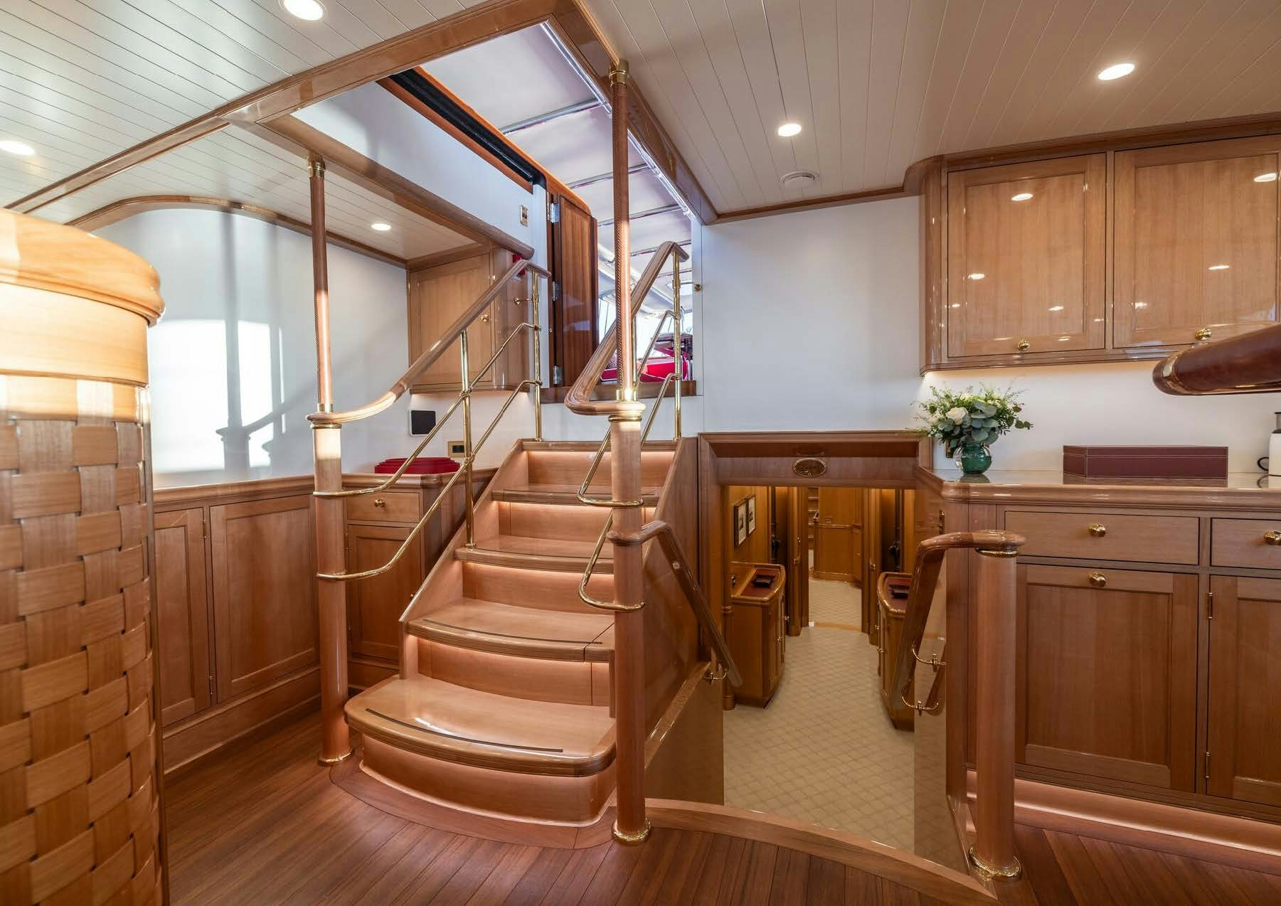 a staircase in a house aboard MAXIMUS Yacht for Charter