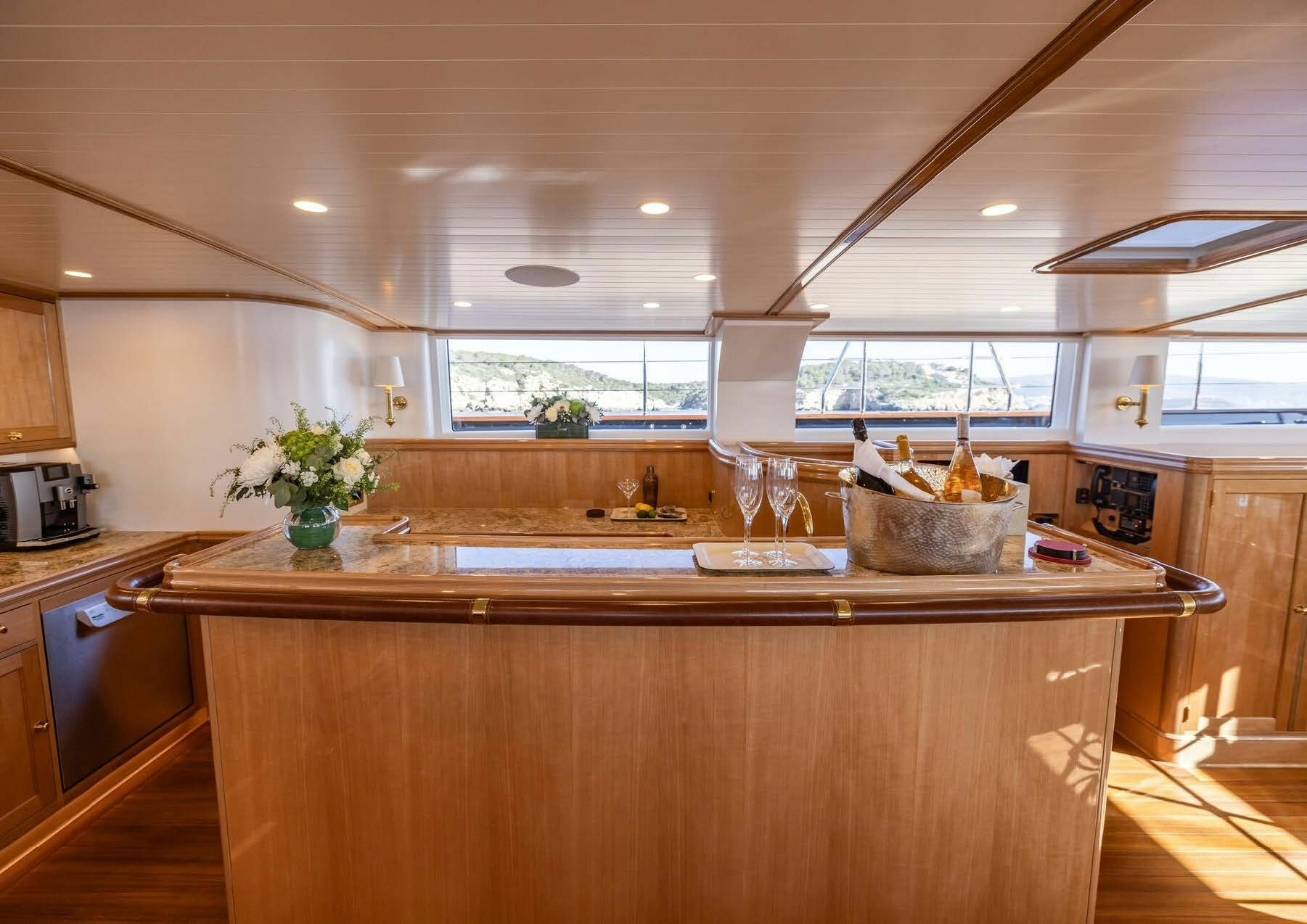 a kitchen with a large island aboard MAXIMUS Yacht for Charter