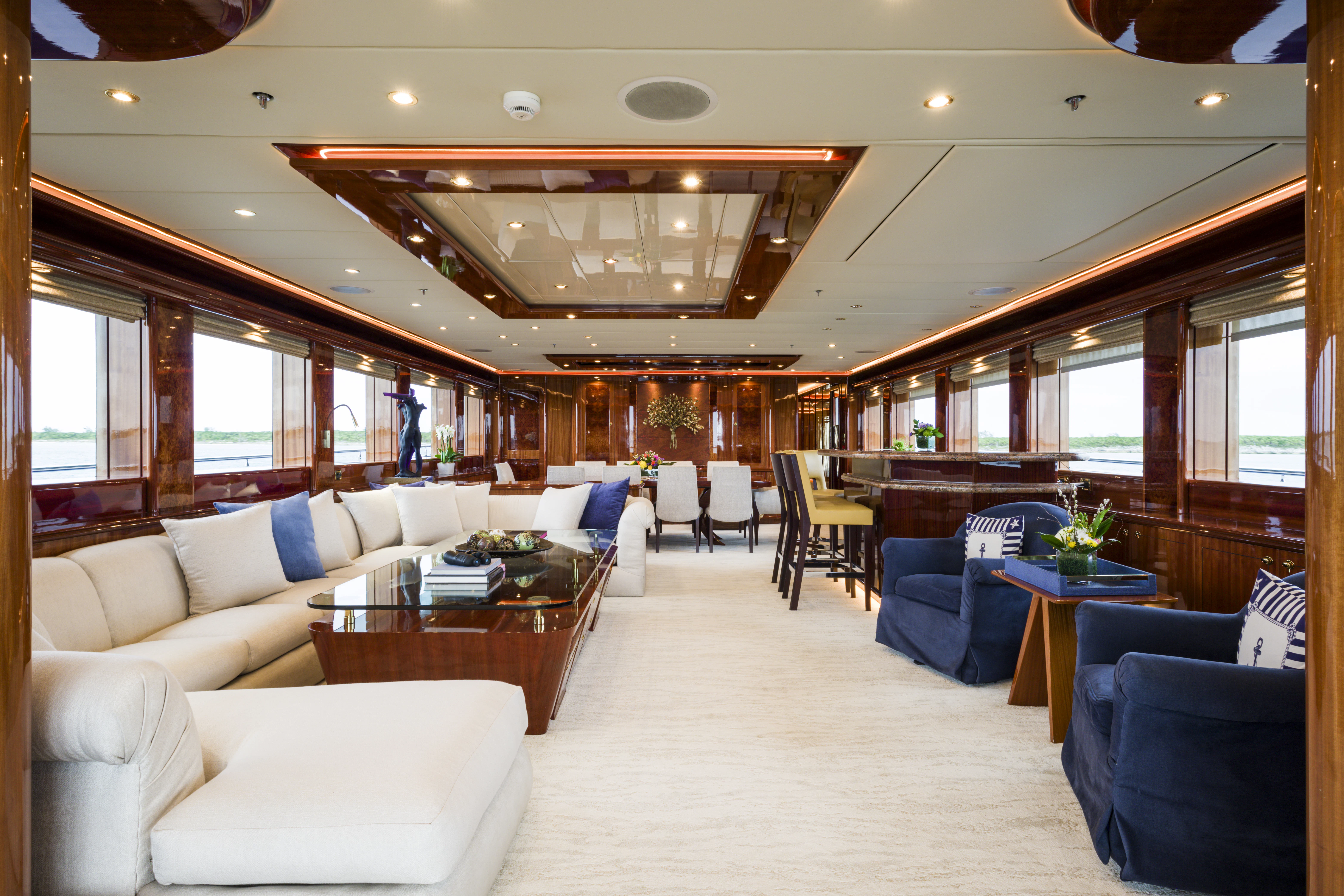 a large room with a couch and a table aboard DUCHESS Yacht for Sale