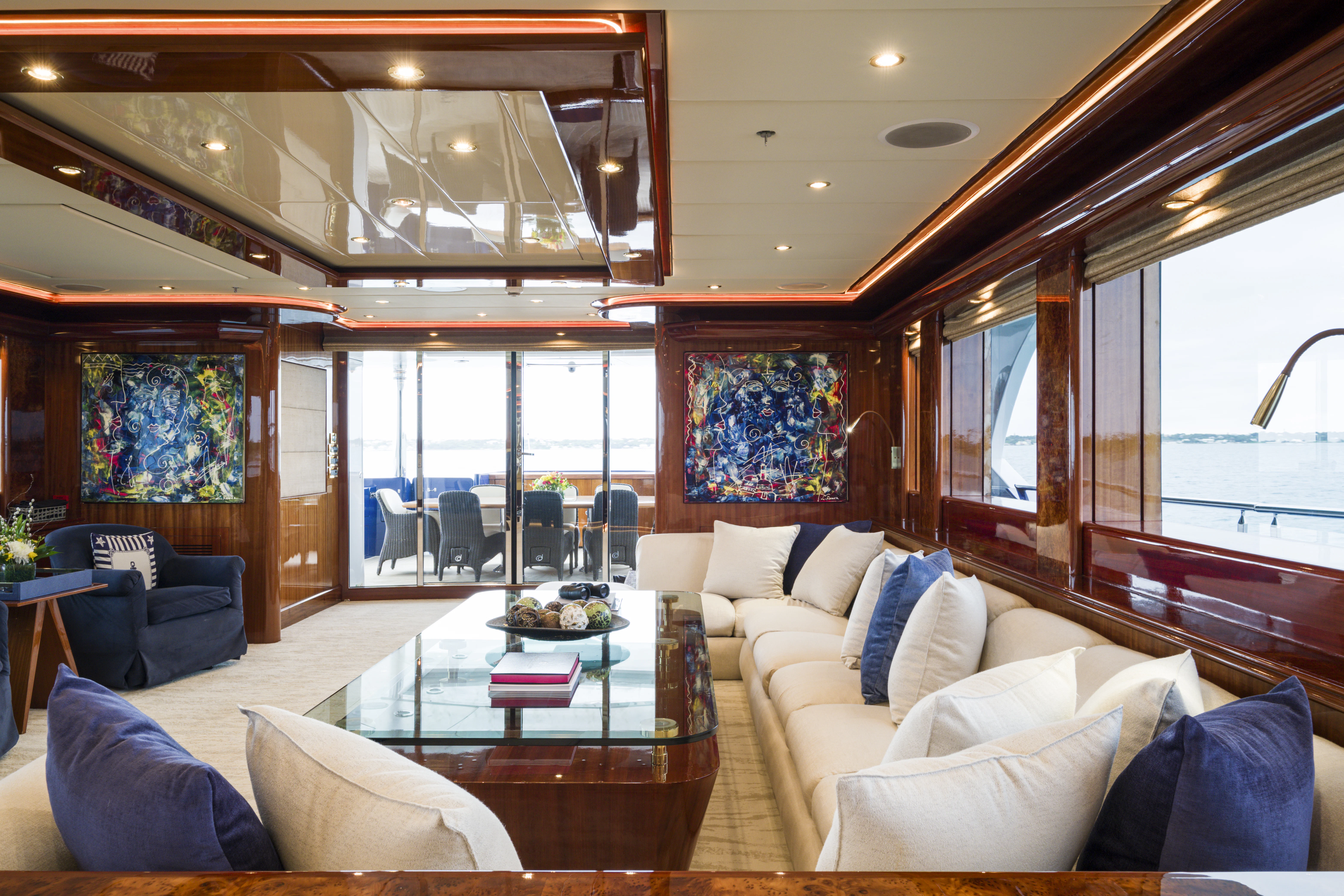 a living room with a large glass window aboard DUCHESS Yacht for Sale