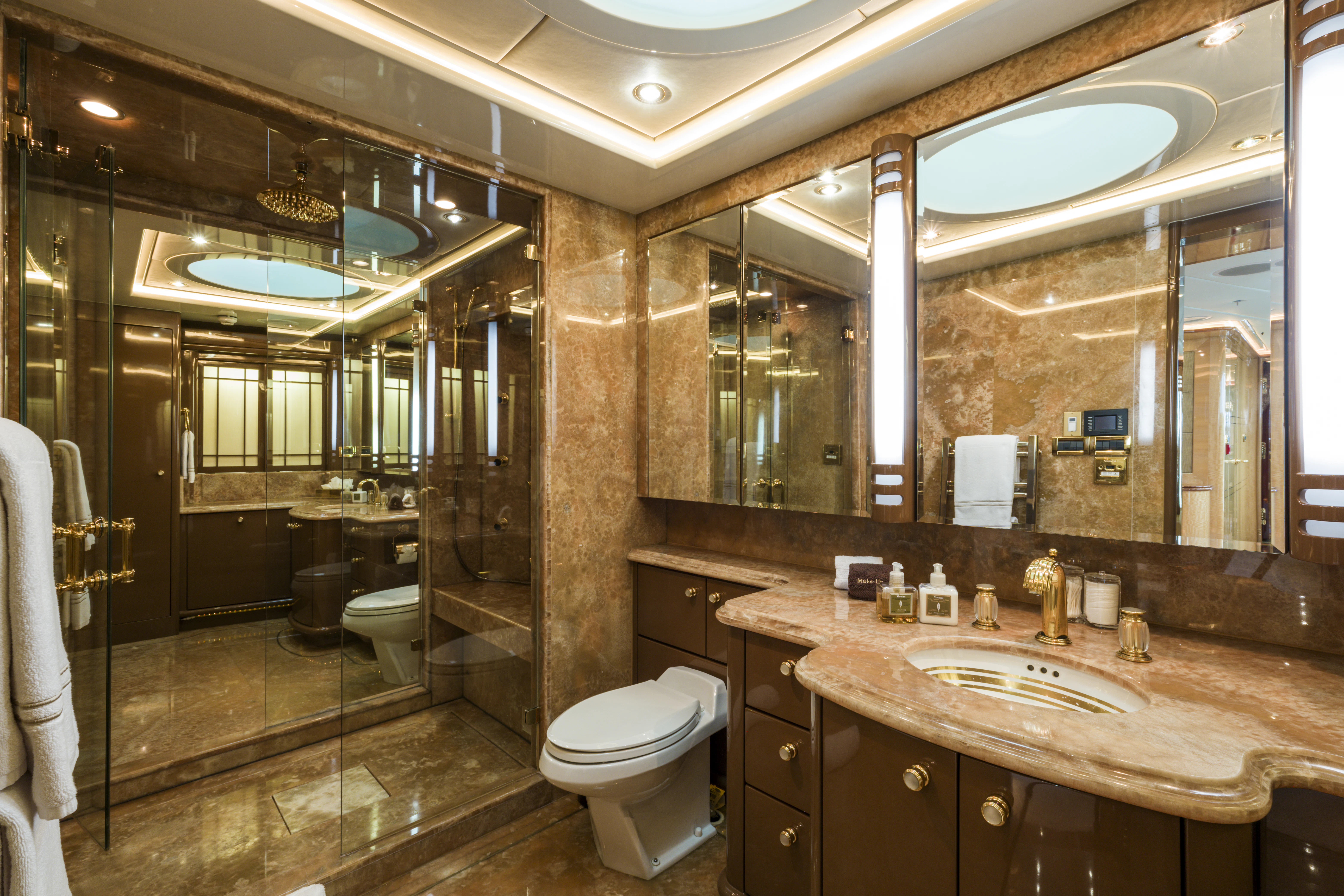 a bathroom with a large mirror aboard DUCHESS Yacht for Sale