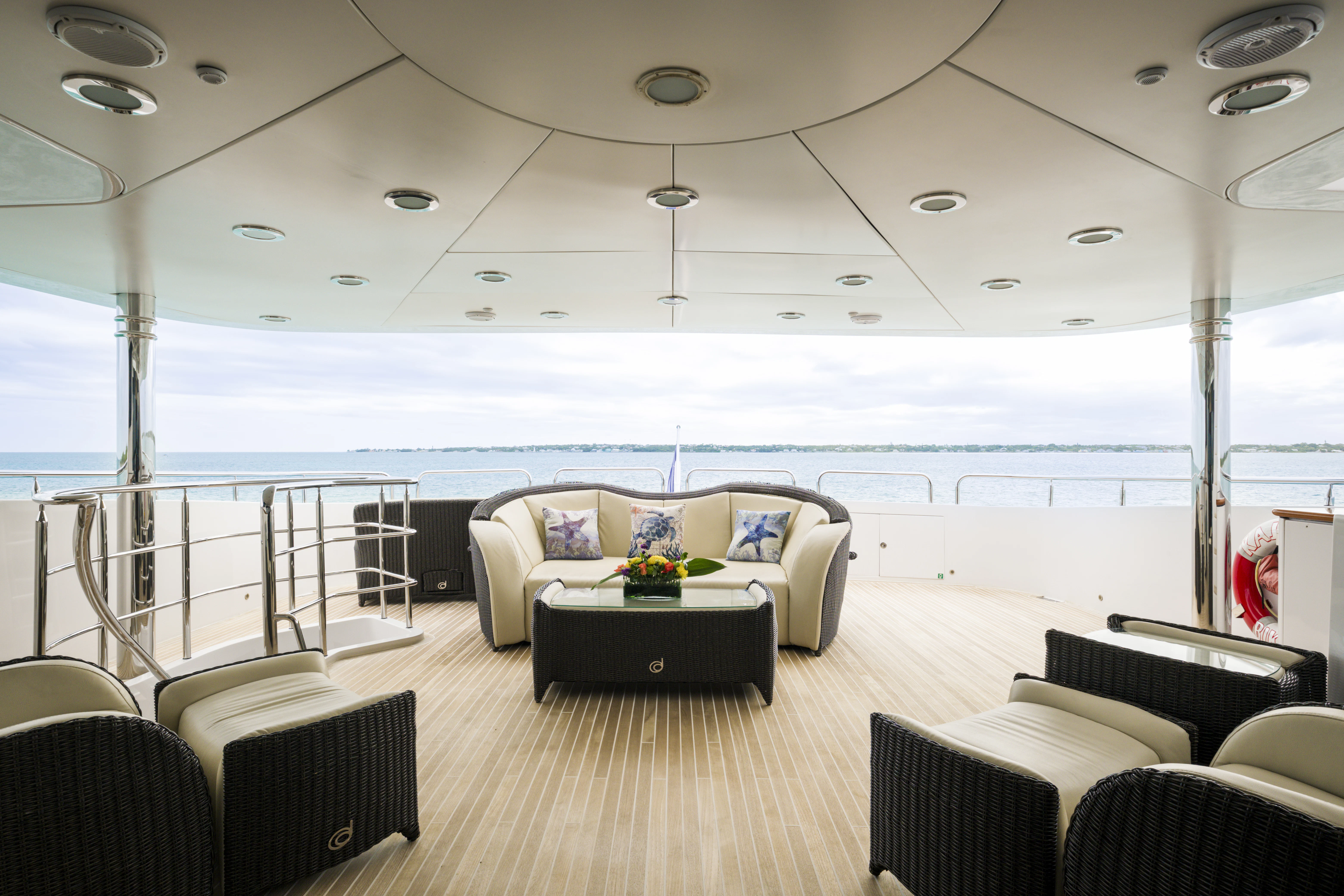 a room with a couch and a table and chairs aboard DUCHESS Yacht for Sale