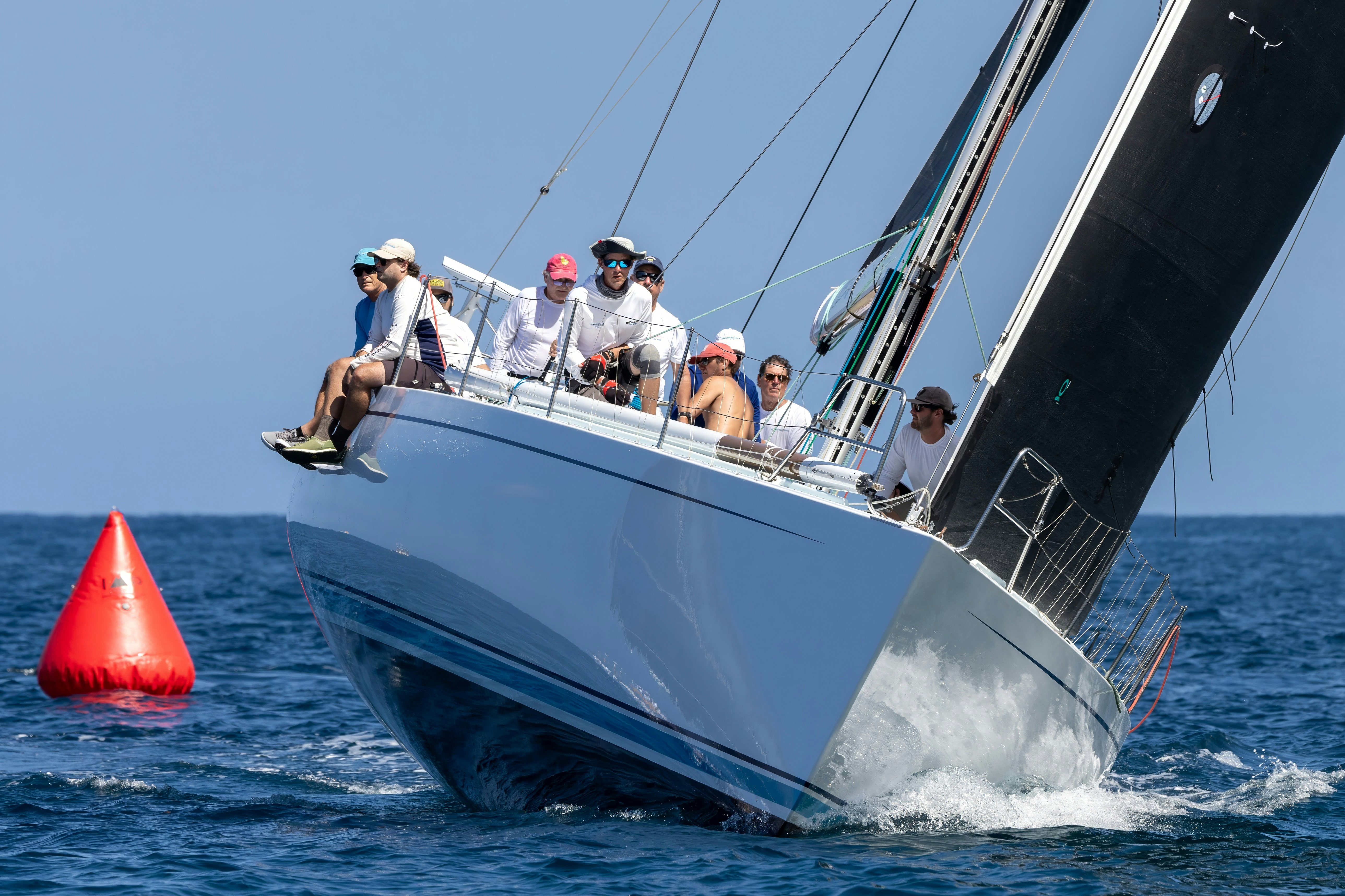 a group of people on a boat aboard GRAND ILLUSION Yacht for Sale