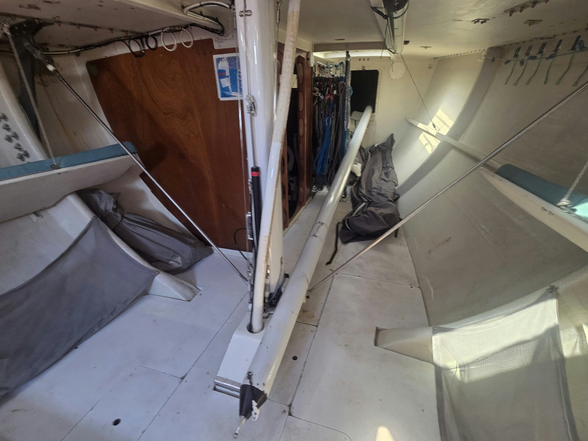 a cat sitting on a staircase aboard GRAND ILLUSION Yacht for Sale