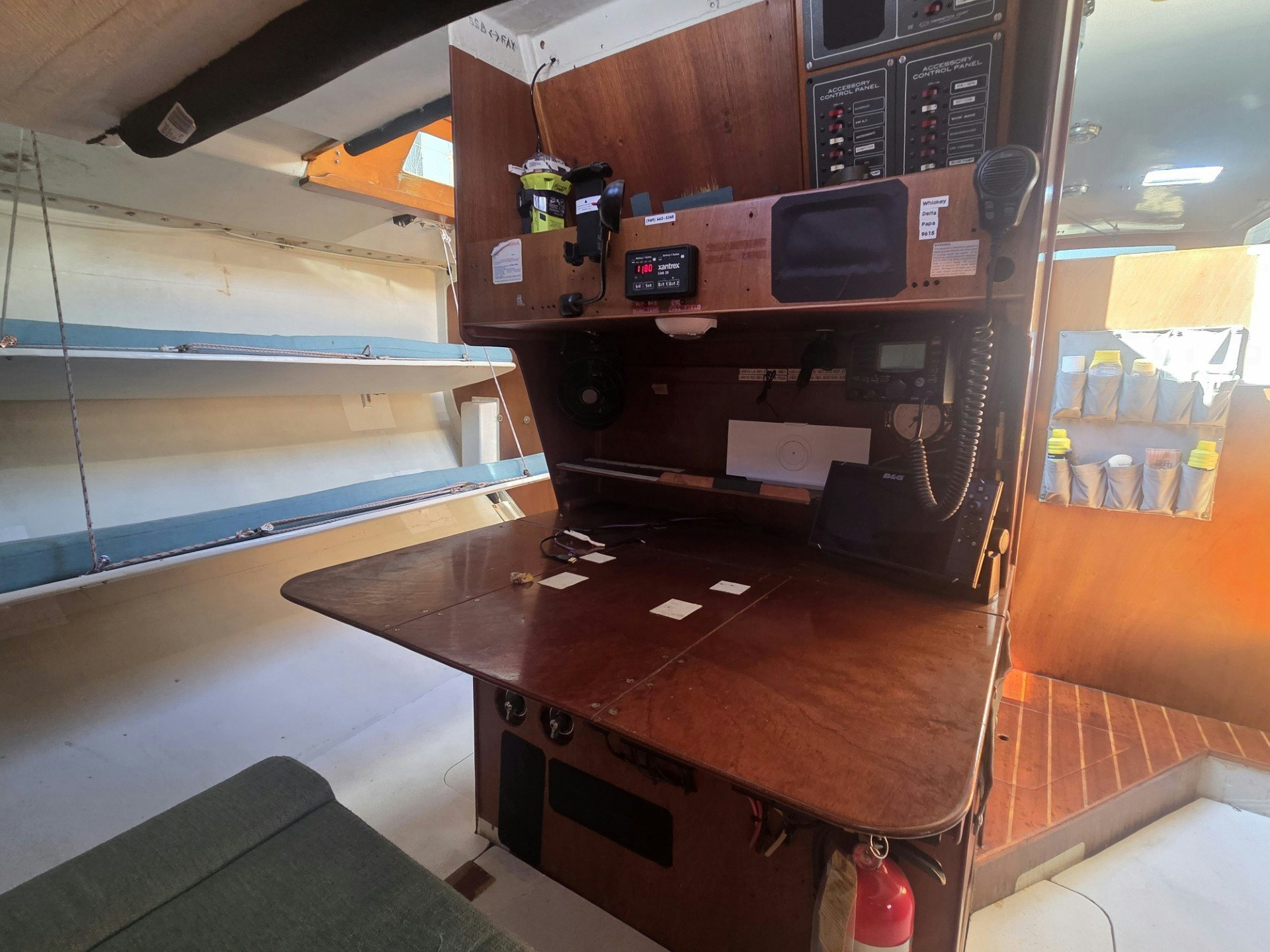 a room with a table and computer aboard GRAND ILLUSION Yacht for Sale