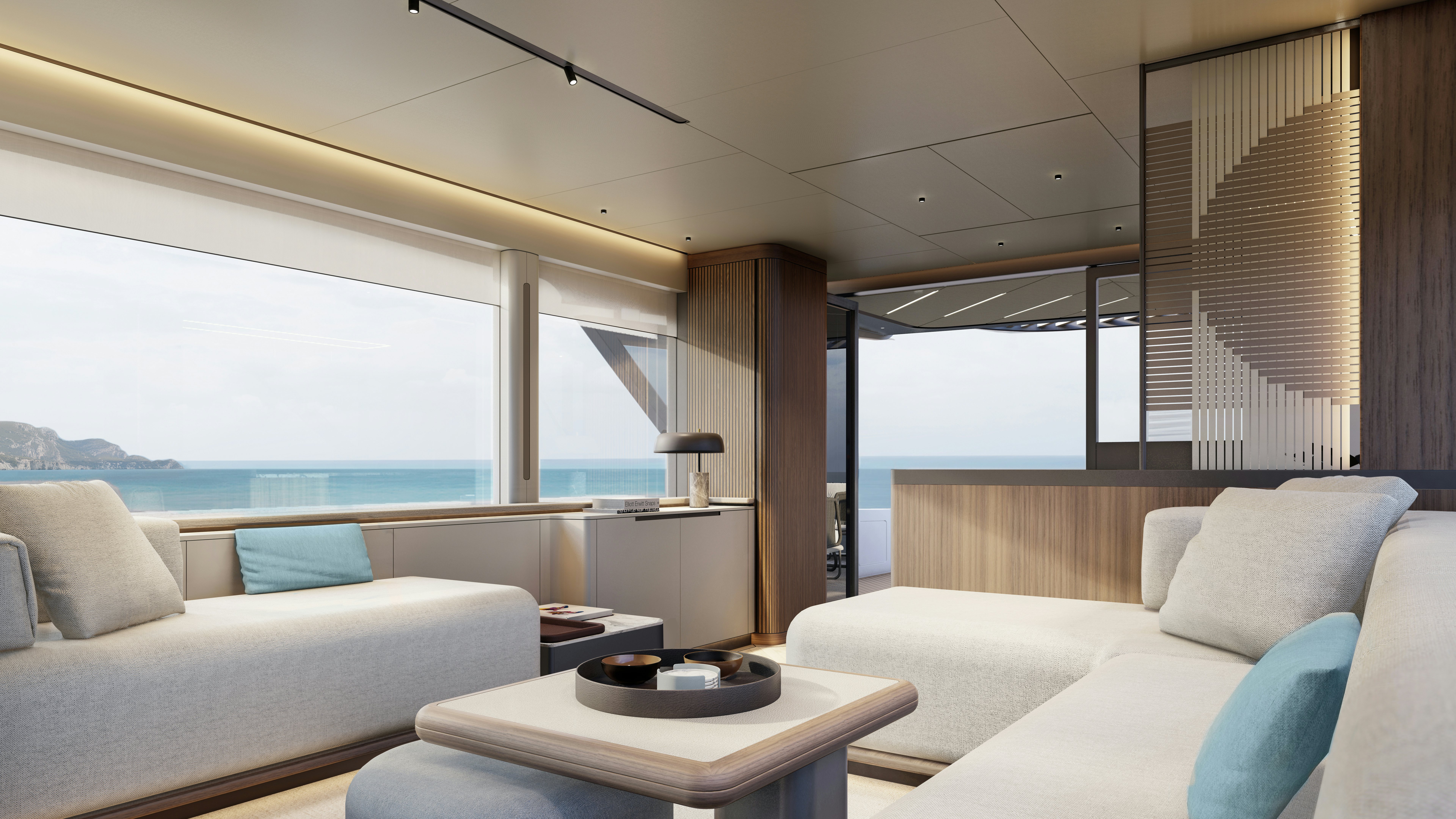 a room with a couch and a table and a window aboard SANCREA 70 Yacht for Sale