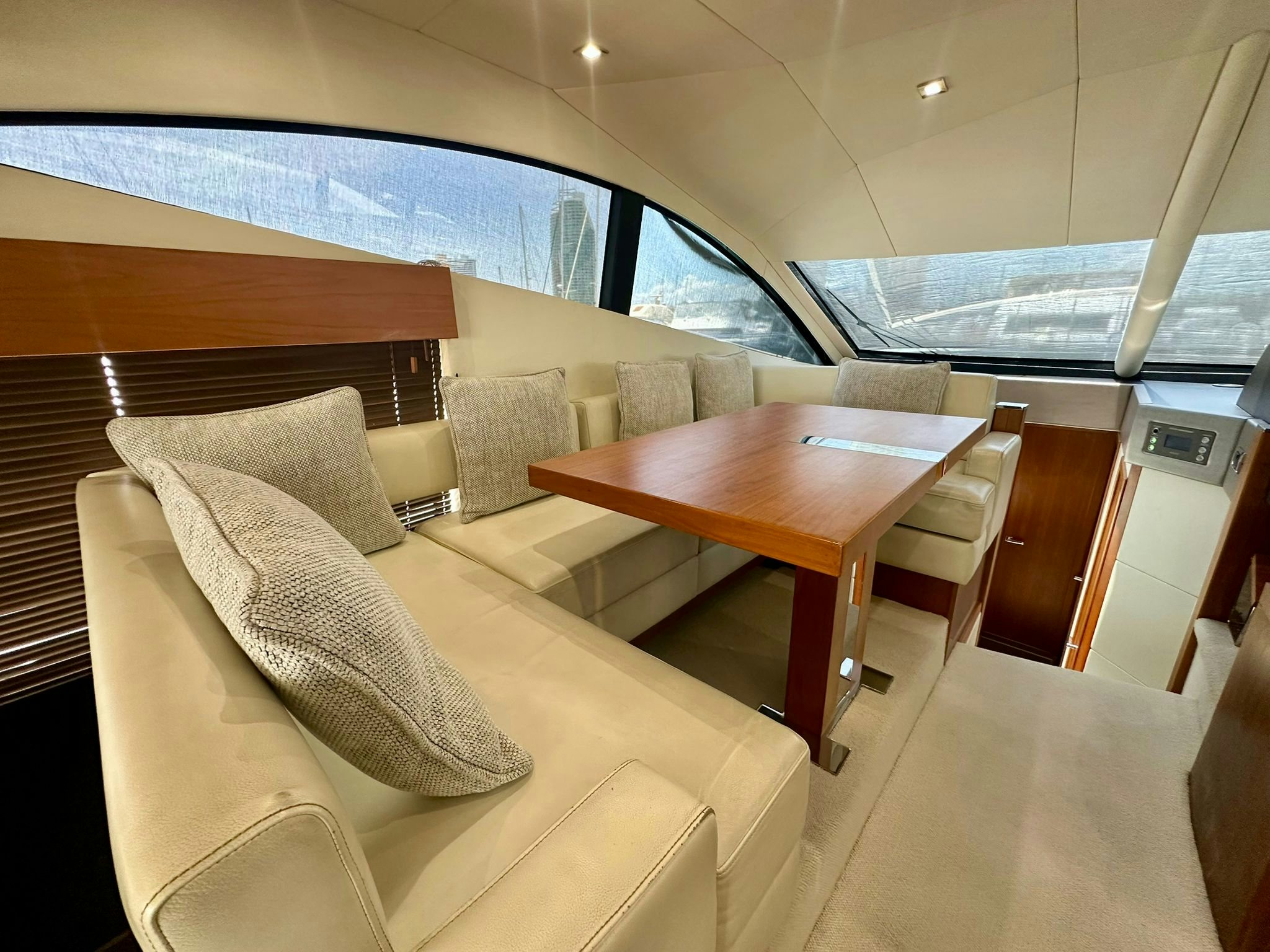 a room with a table and chairs aboard QUICKSILVER I Yacht for Sale