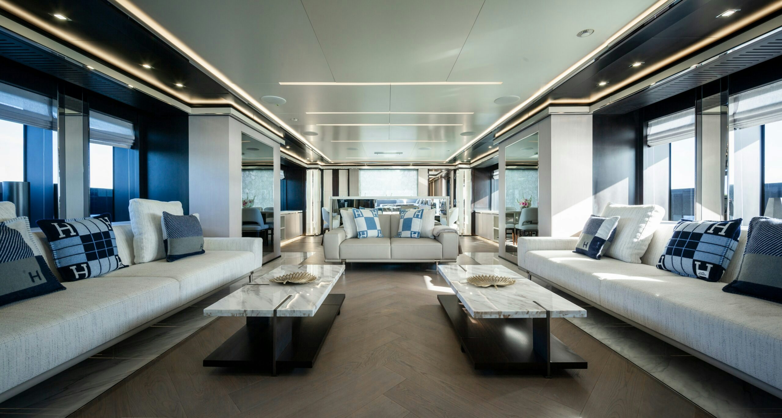 a room with couches and a table aboard PROVOCATEUR Yacht for Charter