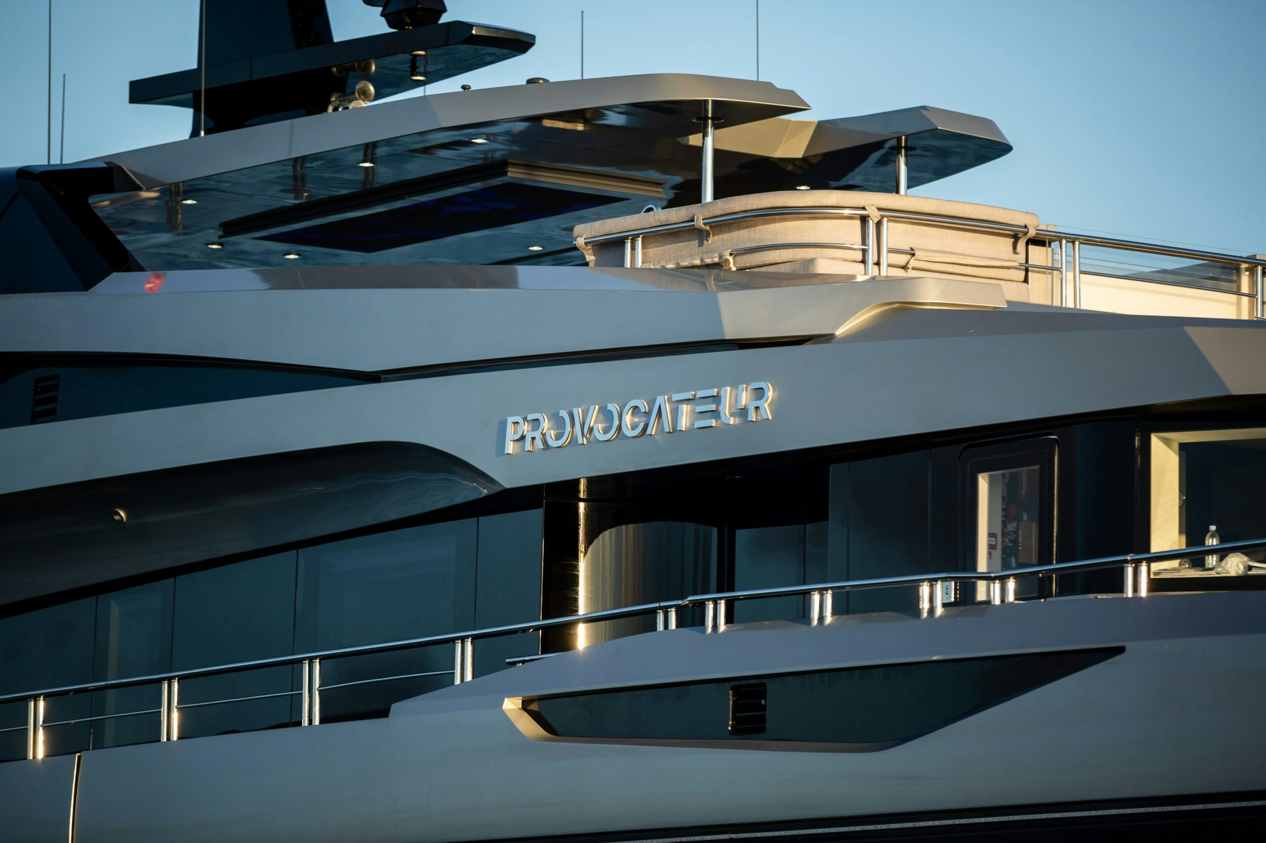 a building with a large glass front aboard PROVOCATEUR Yacht for Charter