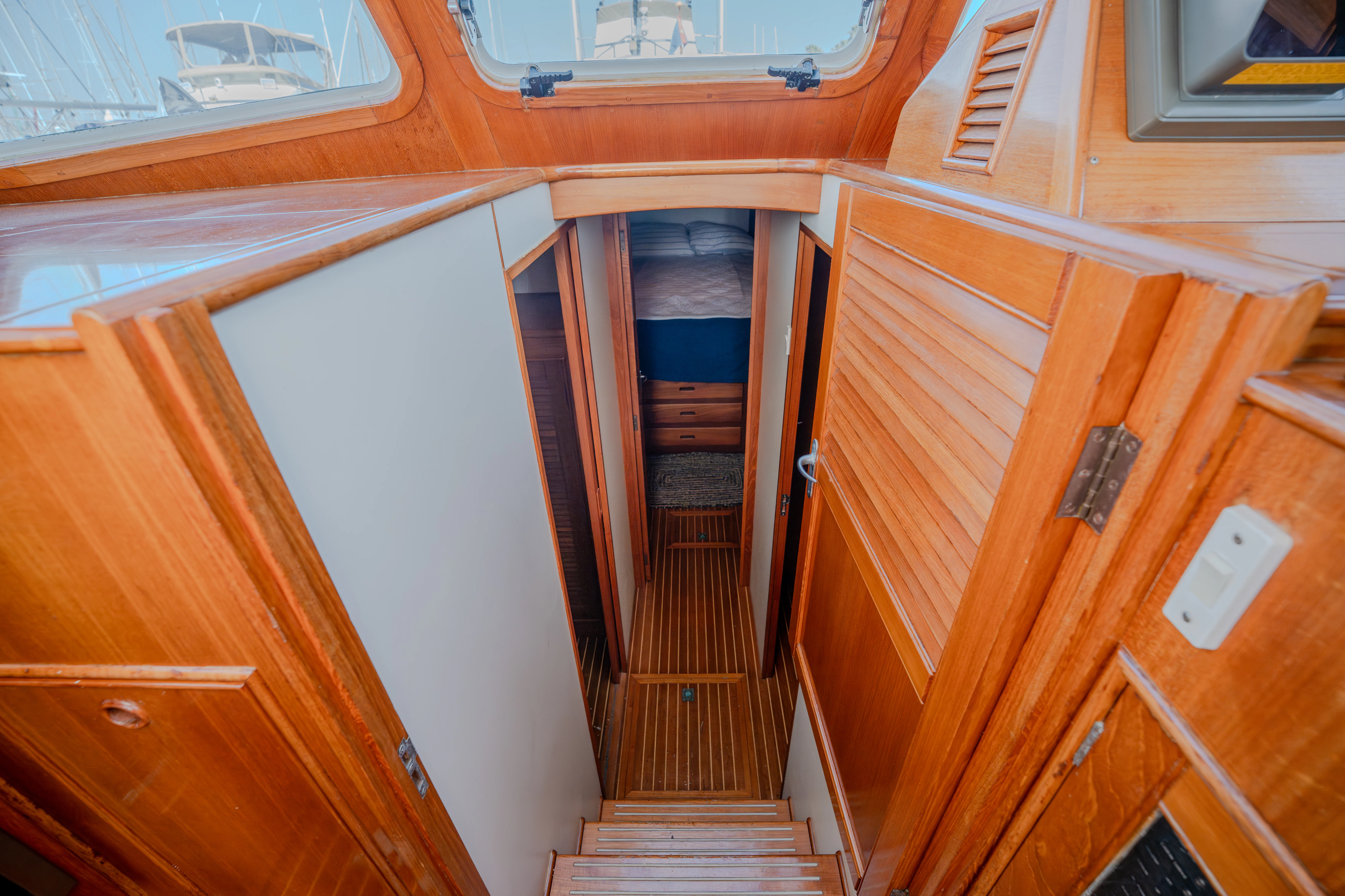 a wooden room with wooden doors aboard OSPREY Yacht for Sale