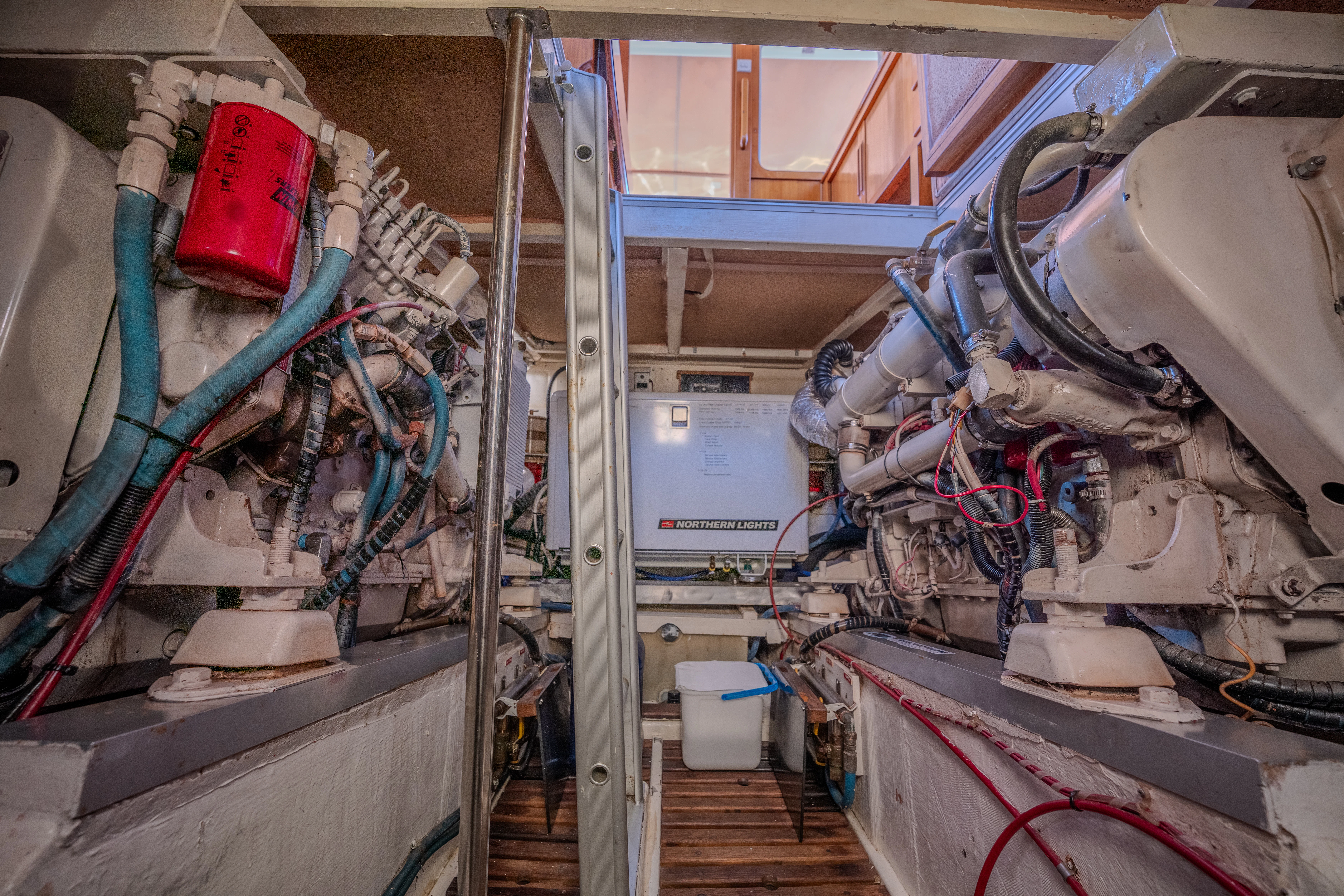 a room with pipes and equipment aboard OSPREY Yacht for Sale