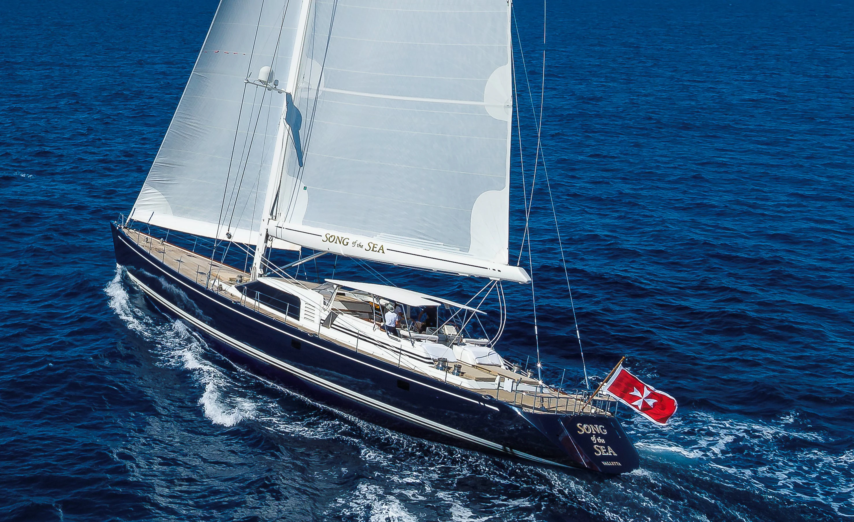 a large white boat in the water aboard SONG OF THE SEA Yacht for Sale