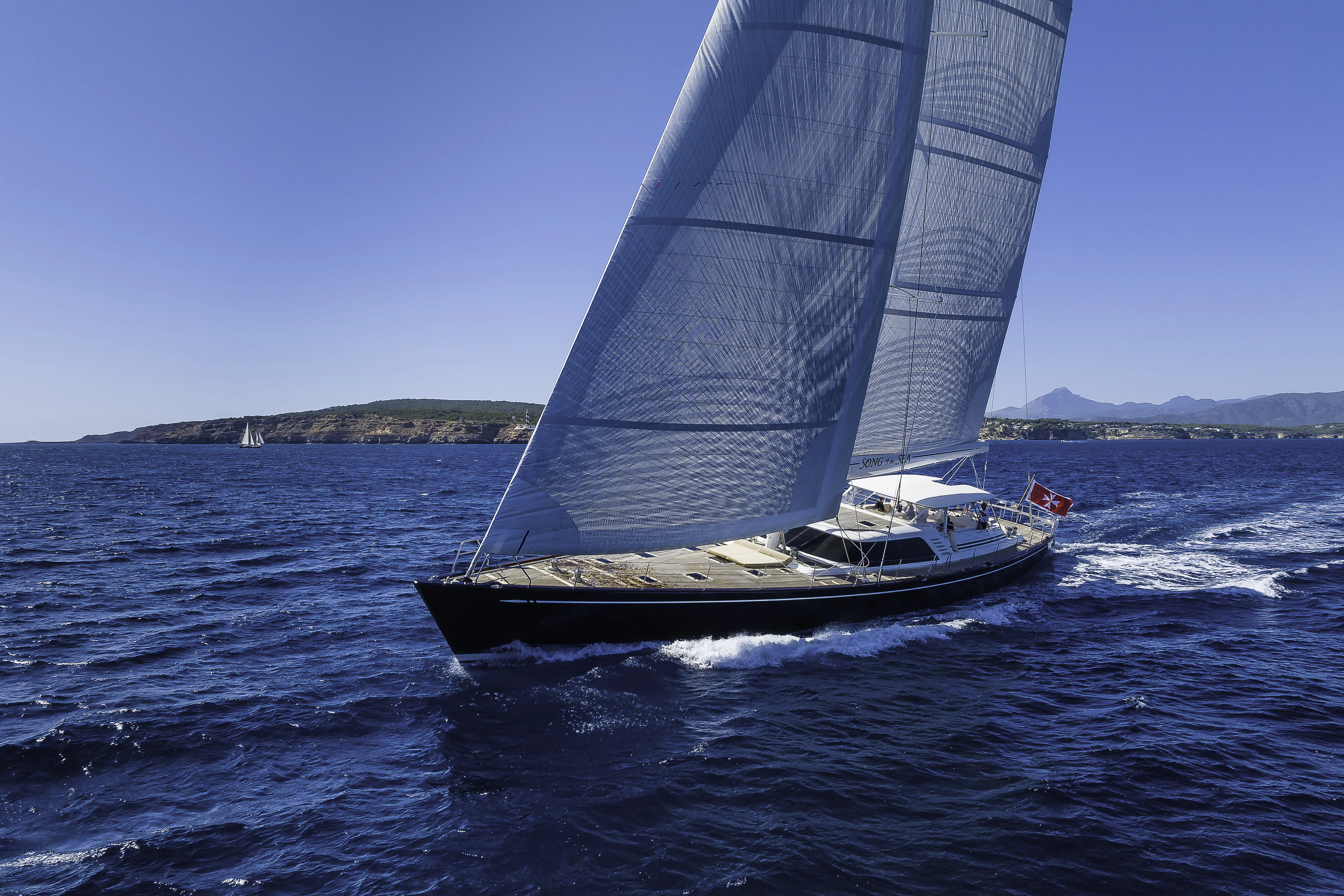 a sailboat on the water aboard SONG OF THE SEA Yacht for Sale