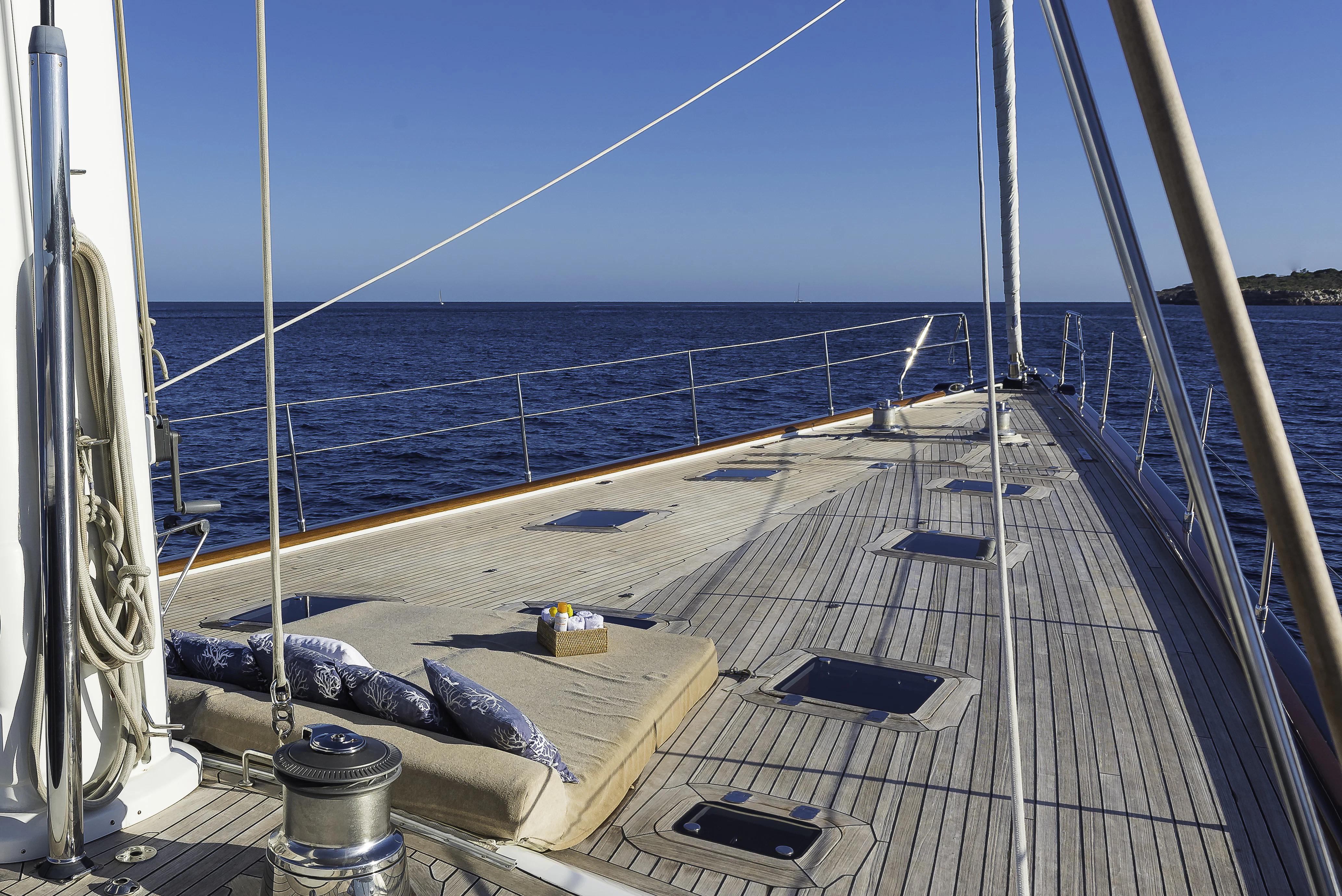 a deck with a boat on it aboard SONG OF THE SEA Yacht for Sale