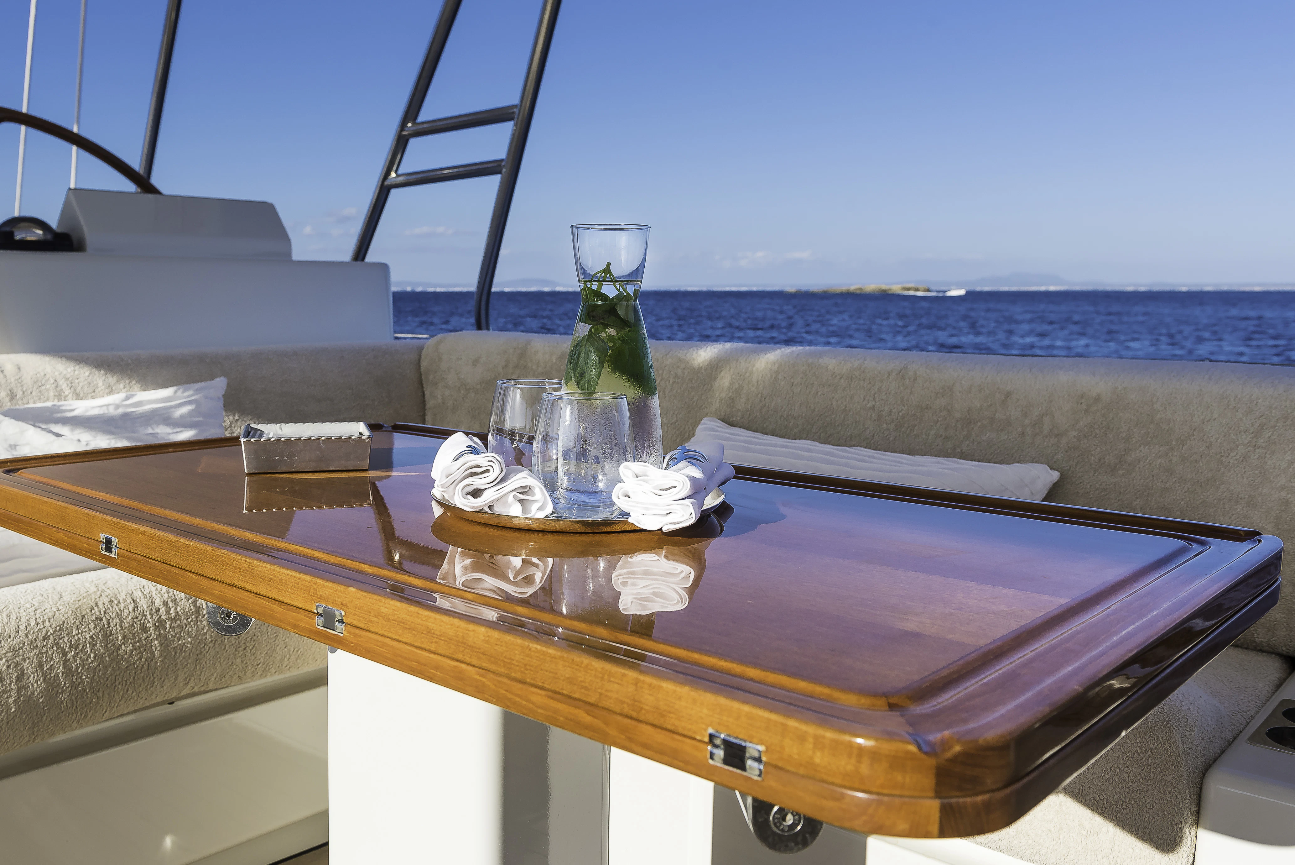a bottle of champagne on a boat aboard SONG OF THE SEA Yacht for Sale